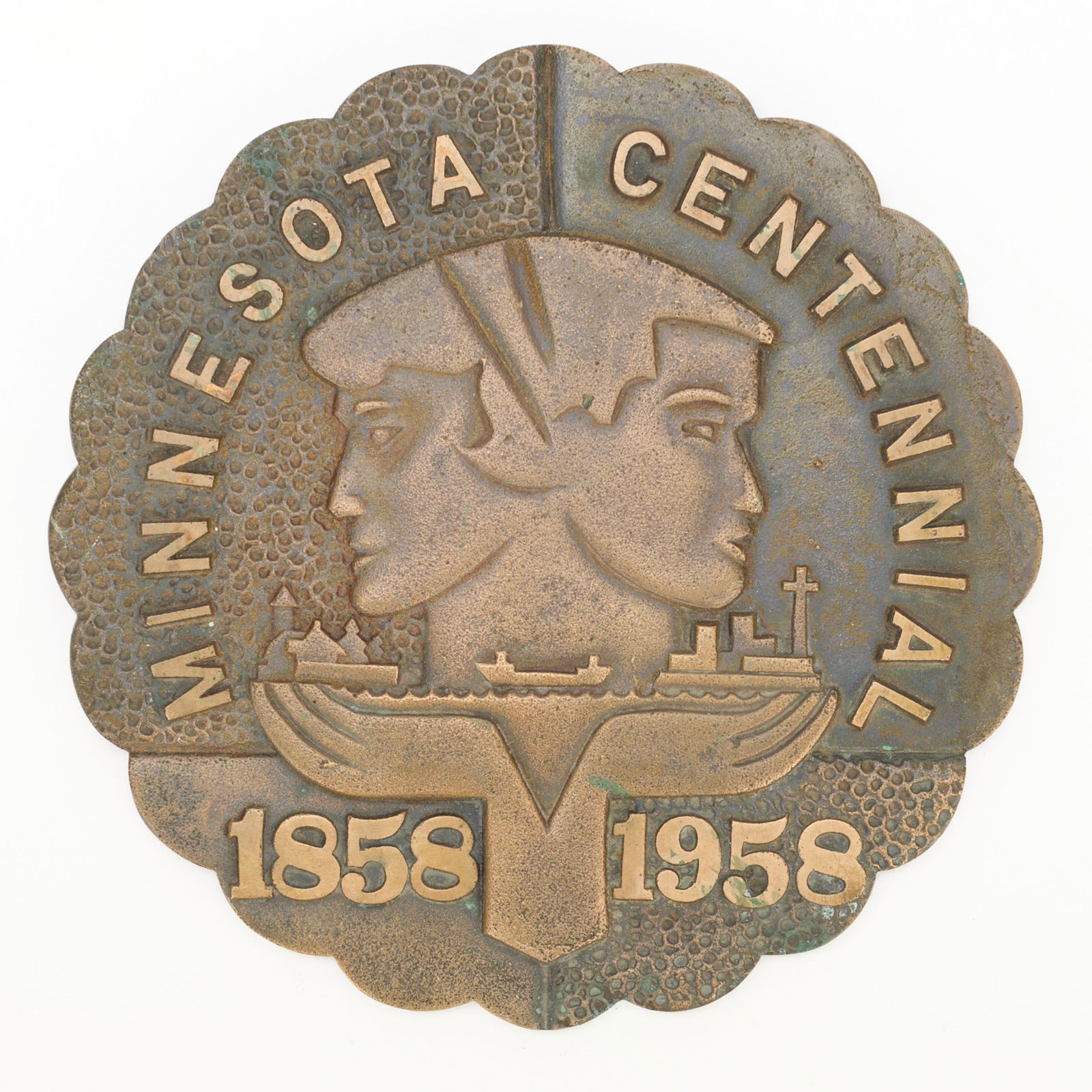 Commemorative Minnesota Centennial Bronze Plaque: Bronze plaque or trivet tile commemorating the centennial anniversary of Minnesota's statehood, 1958. Diameter: 9 in.