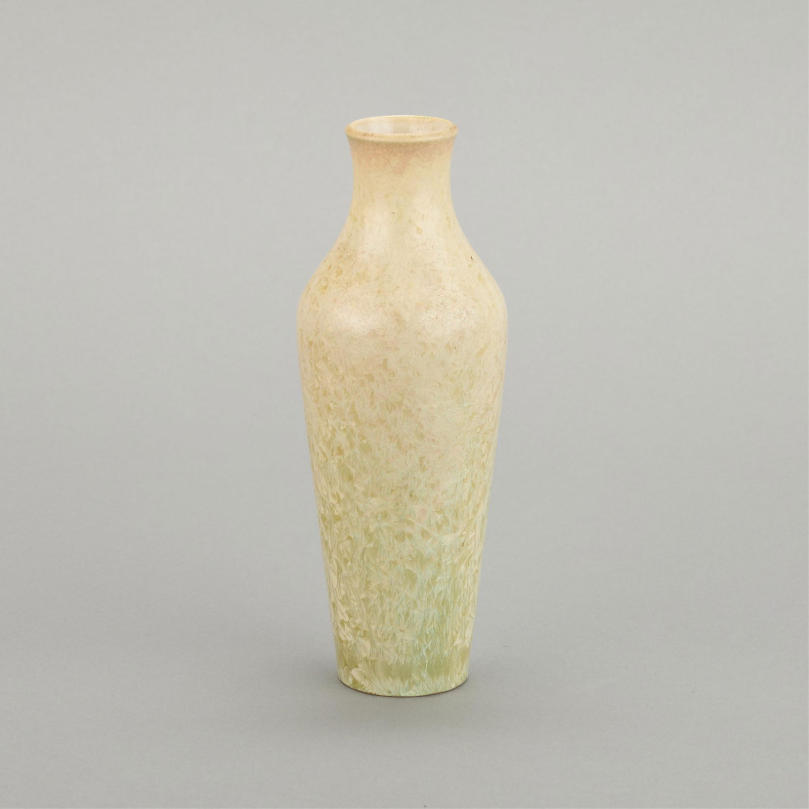 Sevres French Crystalline Porcelain Vase ca. 1900: Manufacture Nationale de Sevres, France. Early 20th century French porcelain vase with crystalline glaze, 1900. Of slender and tapered form, featuring hints of magenta and turquoise along the rims ami