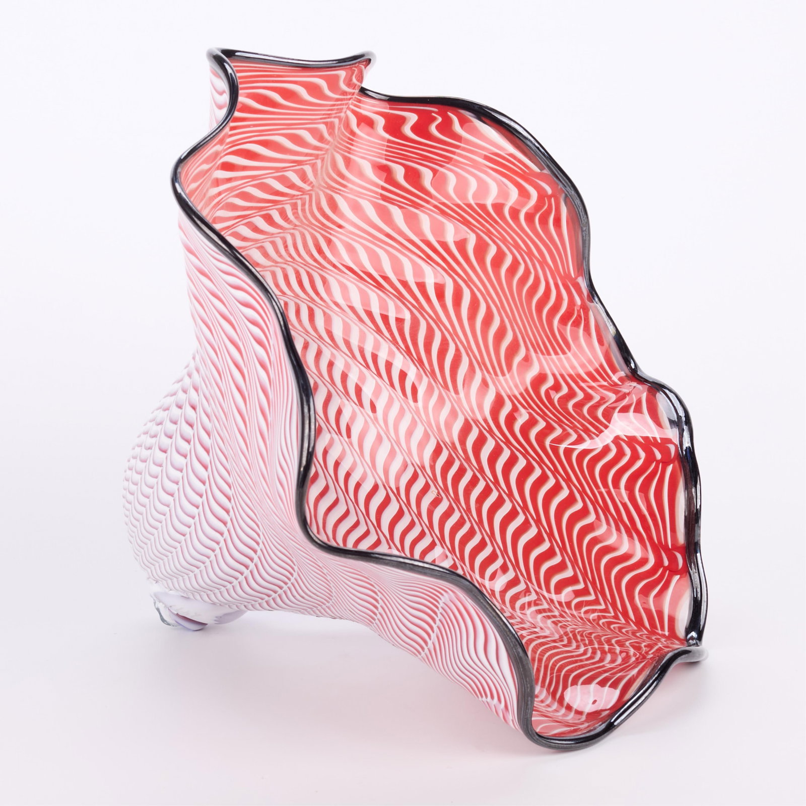 Gwen Knight Abstract Blown Glass Sculpture 1999: Gwen Knight (American, 1931-2017). Abstract blown red and white glass sculpture, 1999. Of a large conical shell form with undulating rim. Signed and dated along the rim. Numbered "2473" along the apex