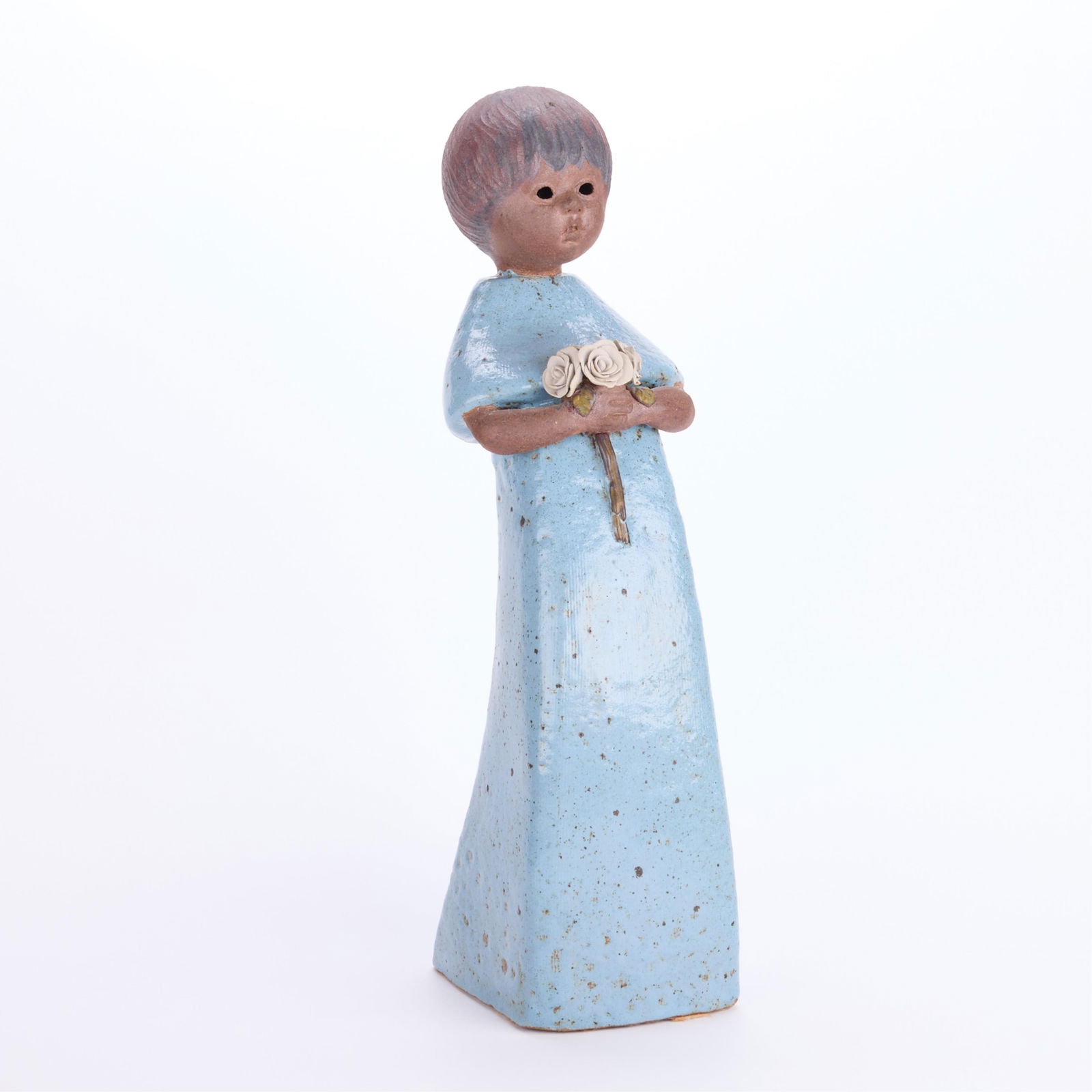 Signed Terracotta Figural Pottery Sculpture 1989: Terracotta pottery statue of a young girl holding a bouquet of flowers, likely roses, 1989. Illegible signature, possibly reading "Voua Expres," and date incised along the lower right corner of the ve