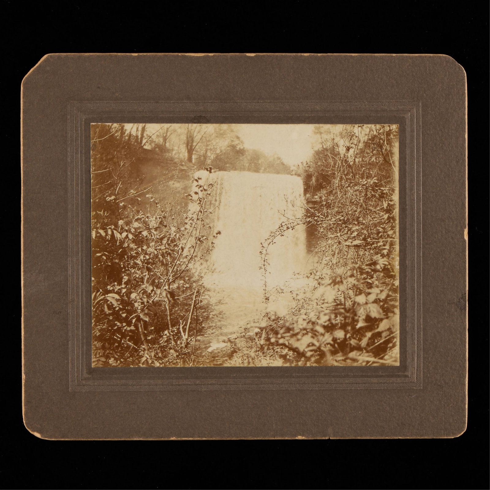 Vintage Carte de Visite Minnehaha Falls Photograph: Vintage photograph or carte de visite depicting the historic Minnehaha Falls in Minneapolis, Minnesota. Height: 6 in x width: 7 in.