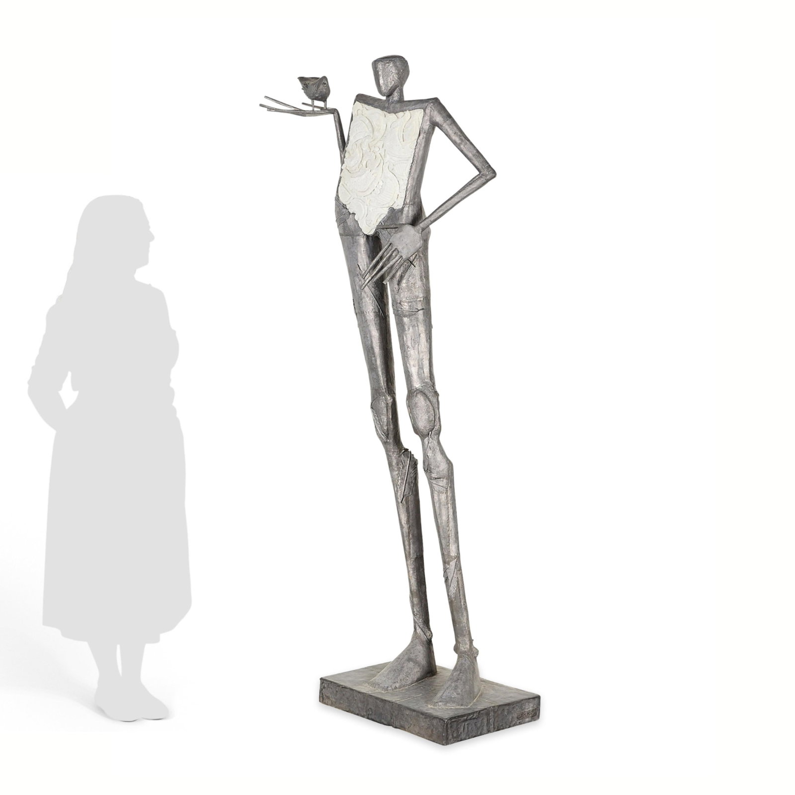 Leslie Hawk Mixed Media Figural Sculpture: Leslie Hawk (American, 1953-2002). Large mixed media lead and cast glass sculpture depicting a tall and elongated standing figure with a bird perched within their right hand, late 20th century. Incise