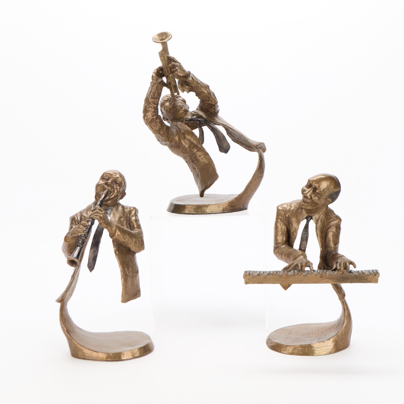 3 Mark Hopkins "Jazz Musician" Bronze Sculptures: Mark Hopkins (American, b. 1953). Group of three bronze sculptures depicting musicians, 20th century. Including: One titled "Jazz Trumpet," 2007. Incised signature and date along the shoulder; edition
