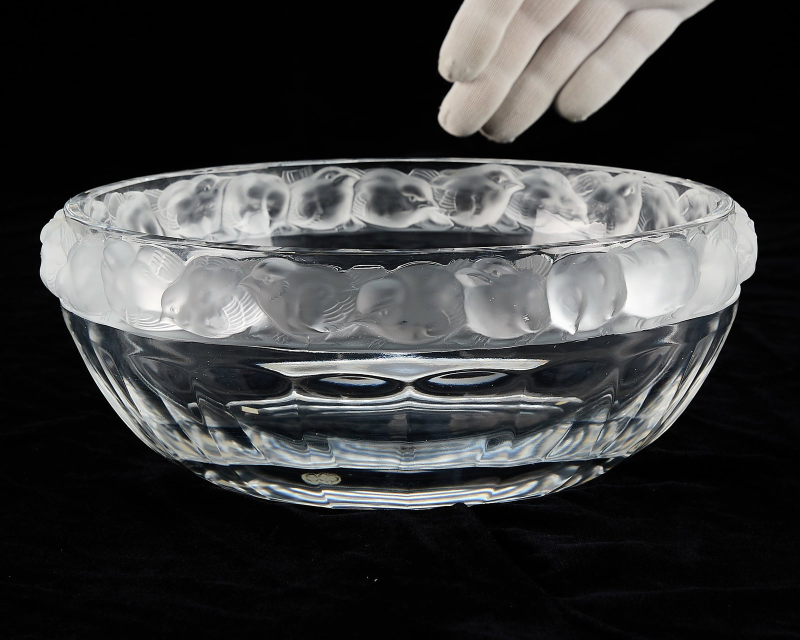 Lalique Crystal Glass "Mesanges" Chickadee Bowl: Lalique, France. Crystal glass bowl in pattern "Mesanges," 20th century. With a band of molded frosted glass chickadees along the rim. Marked along the underside Height: 3 3/4 in x diameter: 10 in.