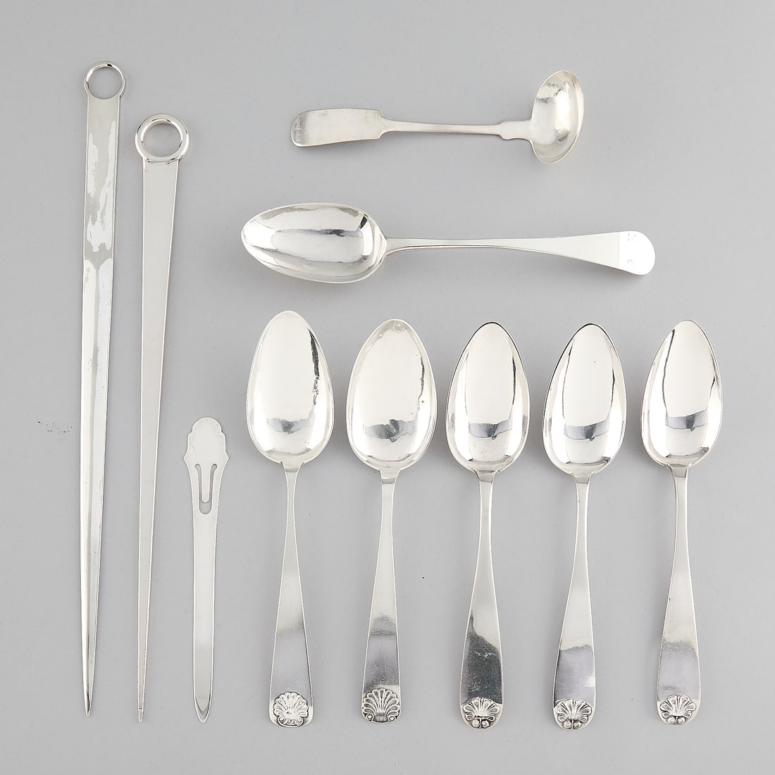 10 Antique American & Norwegian Utensils - 480.5 g: Group of ten antique American and Norwegian silver utensils. Including: Joseph Loring (American, 1743-1815). One American coin silver serving spoon, late 18th-19th century. Stamped "J. Loring" along t