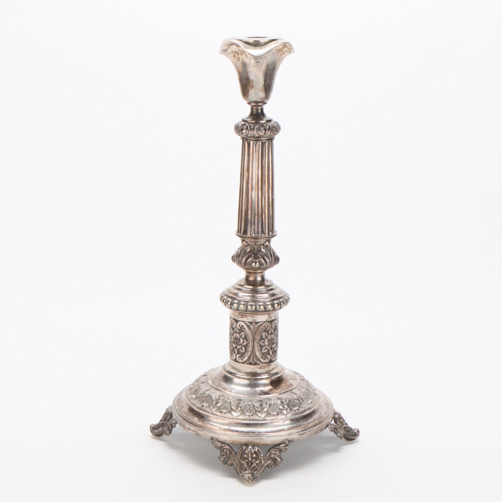 A. Riedel 19th c. Russian 875 Silver Candlestick: Antoni Riedel (Russian, act. 1878-1910). 875 silver candlestick with floral motifs throughout. Impressed "A. Riedel," marked with Warsaw city mark, and numbered "84" zolotniki, indicating .875 silver 