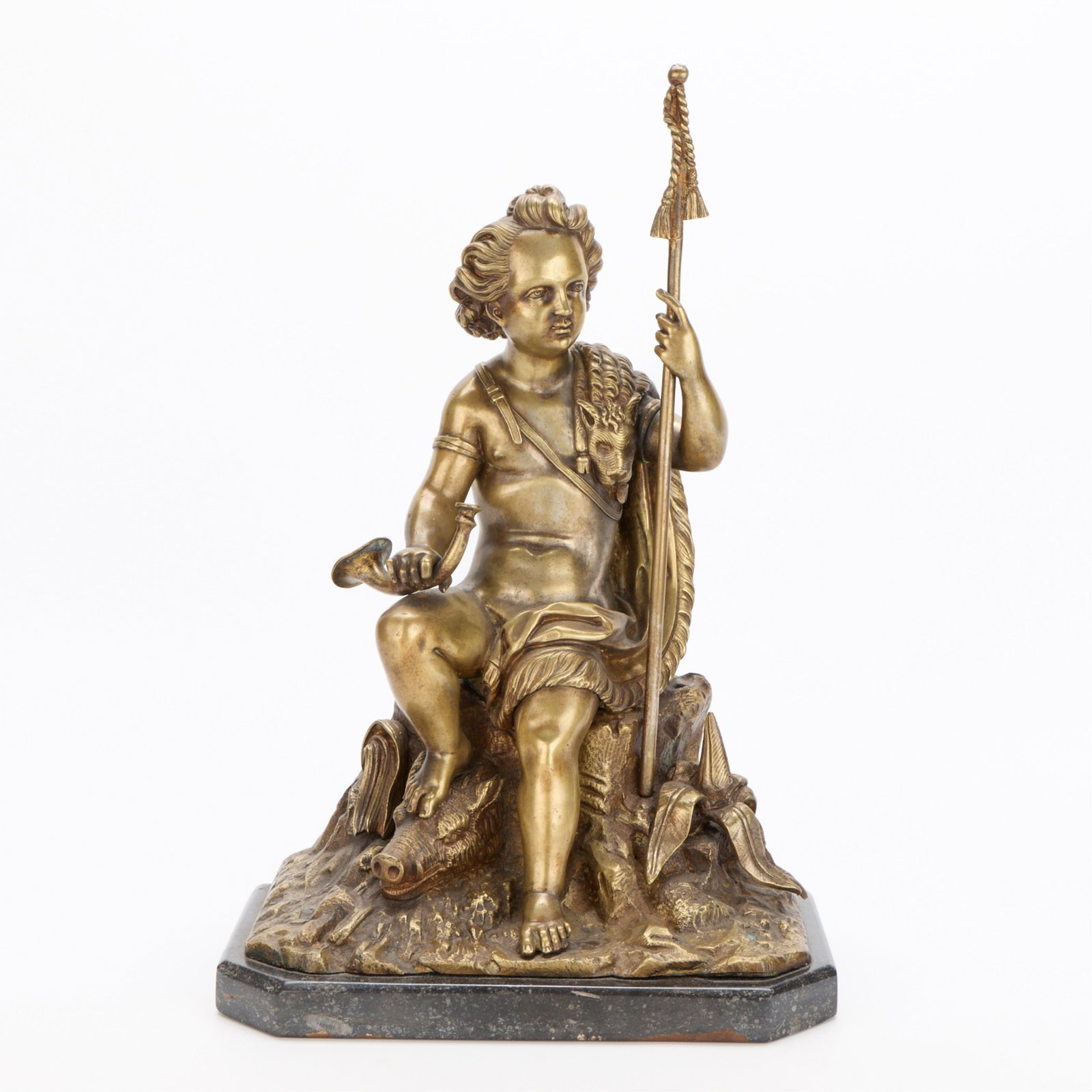 19th c. French Boar Hunt Bronze Sculpture: French Troubadour-style patinated bronze sculpture depicting a triumphant hunter subduing a boar with a pelt draped over the left shoulder, mid-19th century. The Neoclassical male figure gazes leftwar