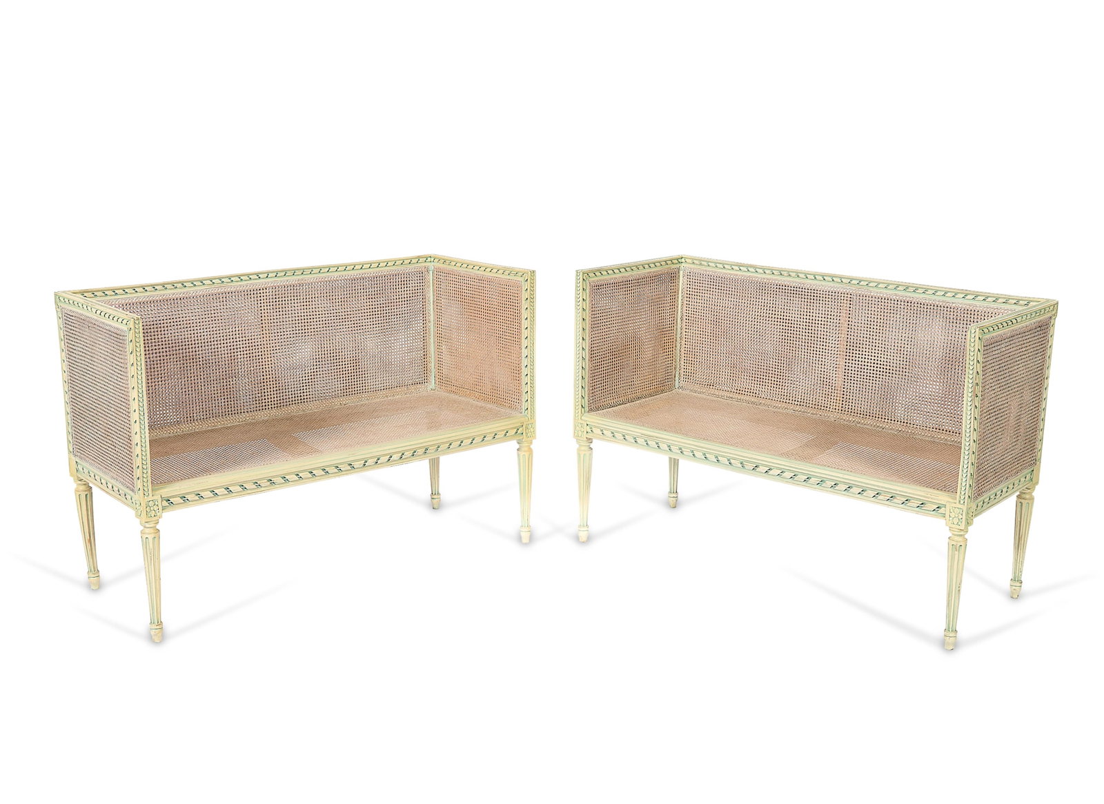 Pr Louis XVI Wood Caned Settee Canapes: Pair of French Louis XVI window seats, settees, or canapes, 19th century. Each with a rectangular caned back, painted frames featuring carved rosettes, and reeded tapered legs, terminating in pointed 