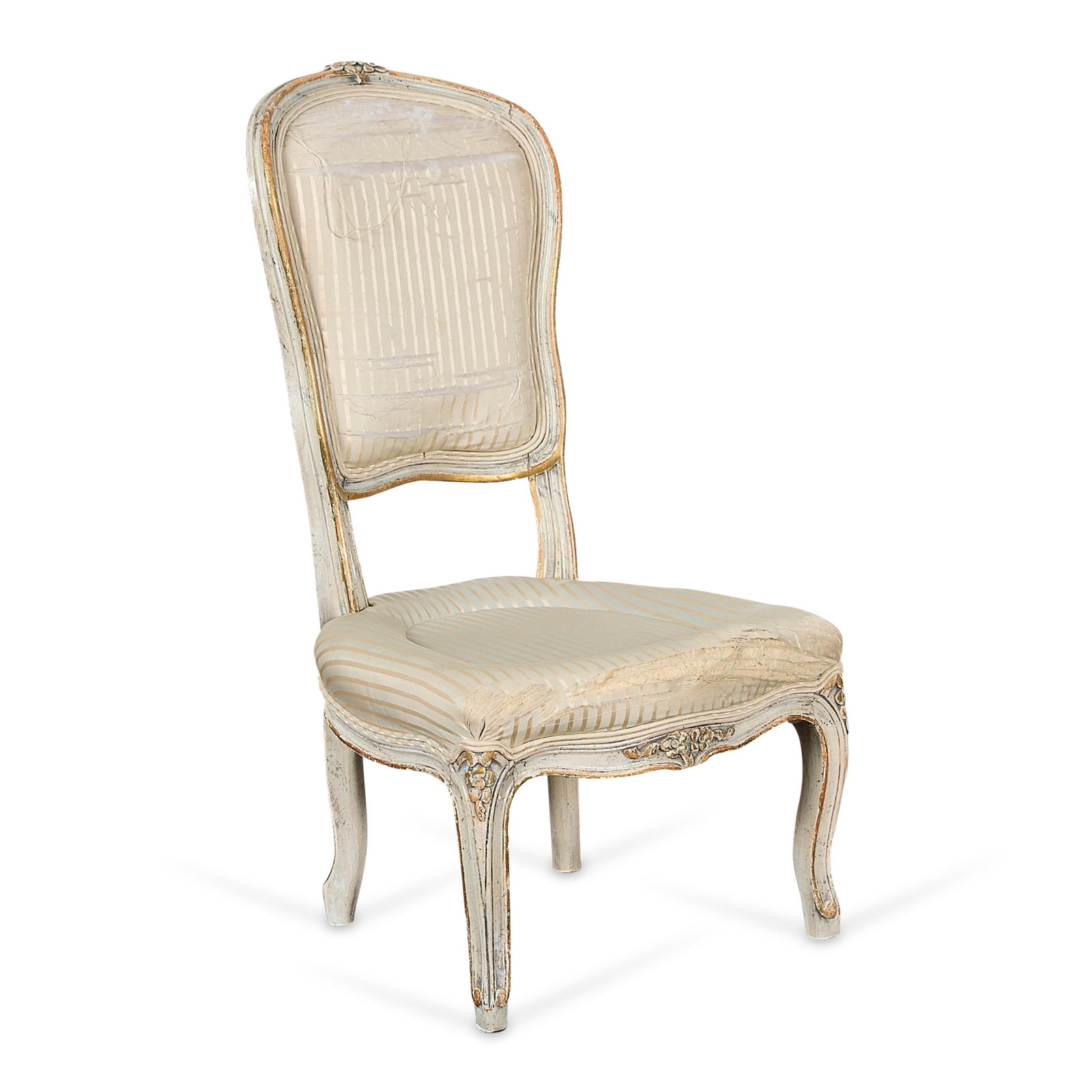 French Louis XV Provincial Chaise Dining Chair: A French Louis XV provincial dining chair or chaise, 18th-19th century. Featuring carved floral motifs along the pale painted and parcel-gilt frame, light blue and cream striped upholstery, and cabrio