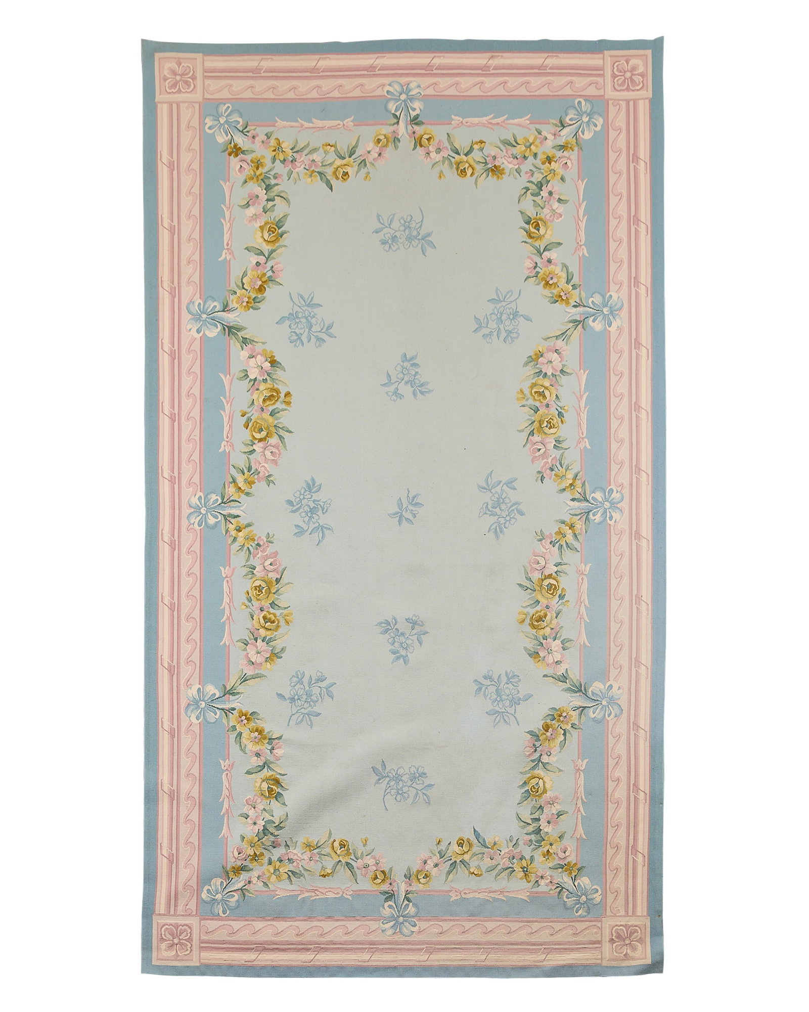 Modern French Aubusson Style Rug 10'10"x6': Modern French Aubusson style hand-knotted flatweave rug textile, 20th century. The carpet with central field depicting garlands of floral motifs on a light blue ground. Border by swags of blossoming p