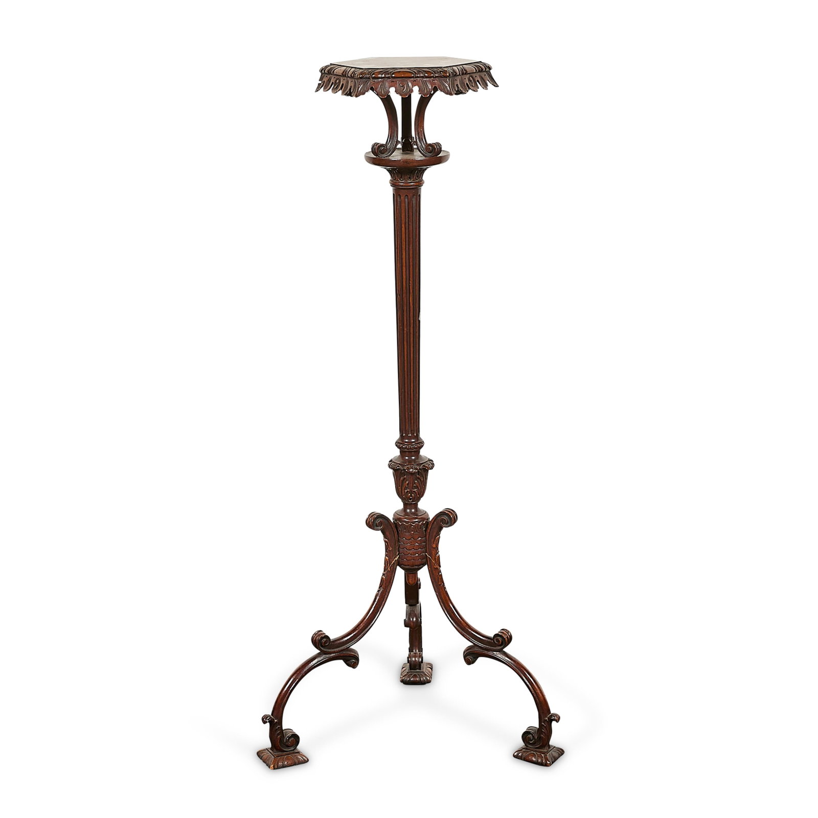 George III Chippendale Carved Mahogany Torchere: George III or Chippendale carved mahogany torchere plant stand, 19th century. An octagonal top with acanthus-carved frieze atop a reeded, tapered stem with scrolling, downswept legs terminating in rec