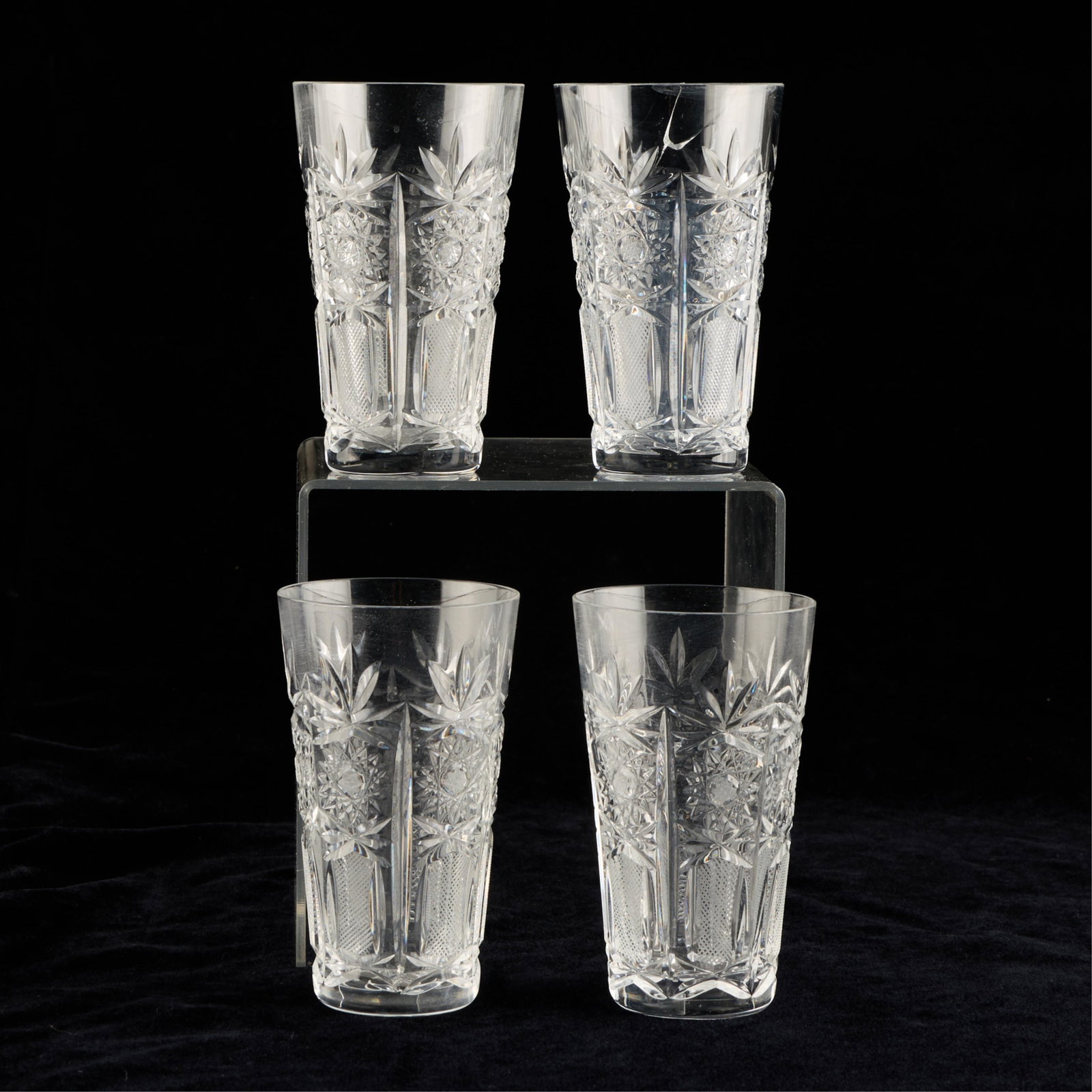 4 MCM Bohemian Cut Crystal Highball Glasses: Set of four mid-century modern Bohemian cut crystal highball glasses. Provenance: The Distinguished Collection of Leo & Doris Hodroff. (Each) height: 4 3/4 in x diameter: 2 3/4 in.