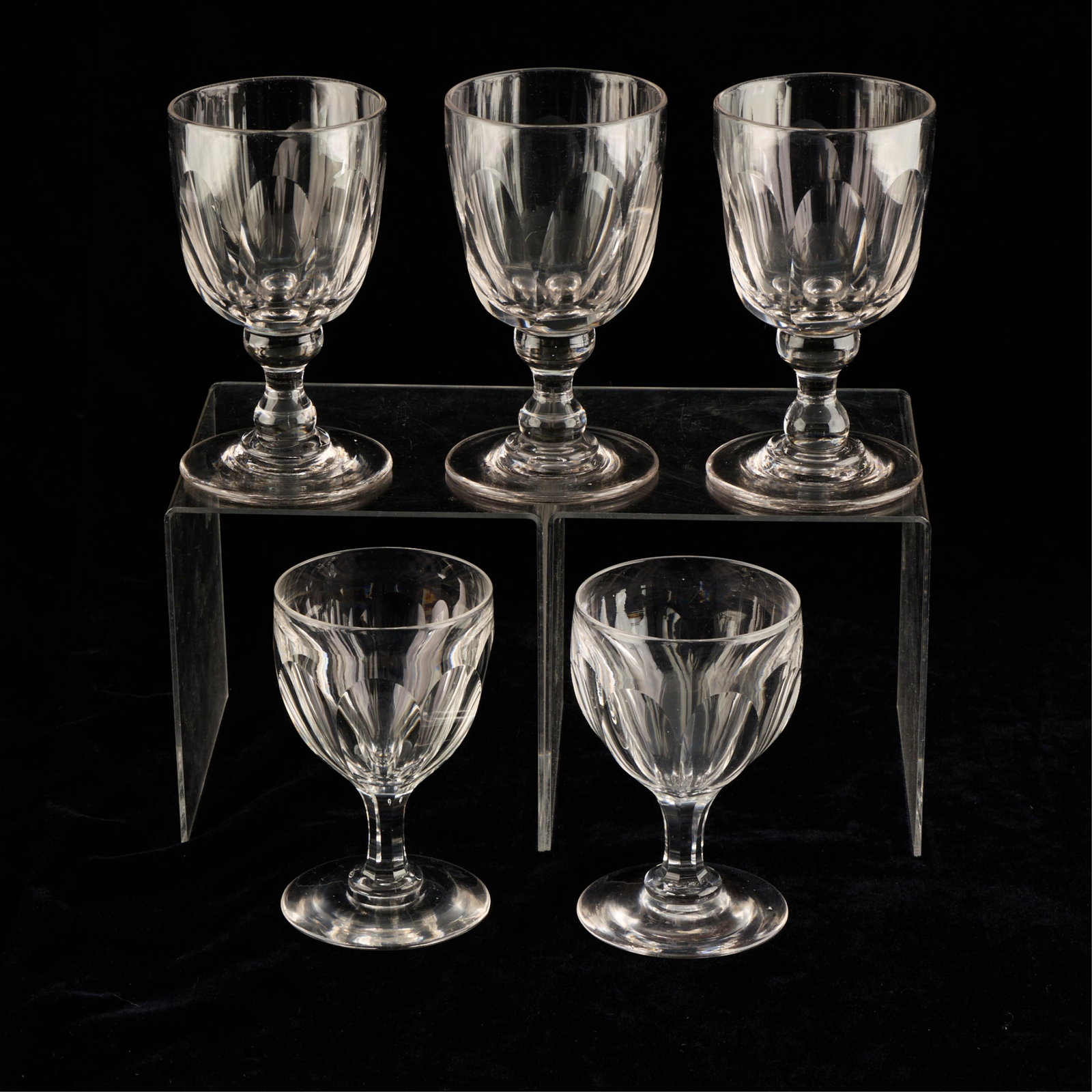 5 Victorian Slice-Cut Crystal Rummer Glasses: Group of five Victorian slice-cut crystal glass stemware, 19th century. Including three larger wine hocks or water goblets with two smaller rummer glasses. Each with deep and flat faceted cuts along t