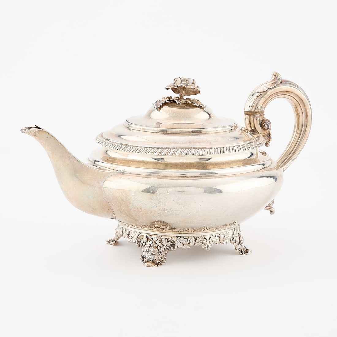 Barnard Victorian Sterling Teapot 24.03 ozt: Edward, Edward Jr., John & William Barnard, England. Victorian sterling silver teapot with rose finial and decorative handle & feet, mid-19th century. Marked with lion passant indicating sterling, cro