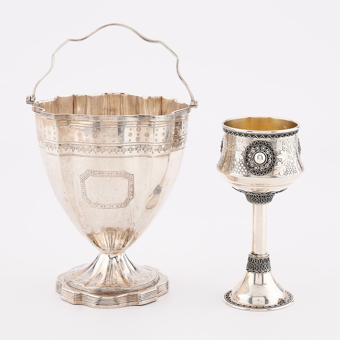 Sterling Kiddush Cup & English Basket 11.32 ozt: Group of two sterling silver vessels. Including: One Bezalel School-style Israeli sterling silver kiddush cup with gilt-wash interior and cannetille decoration. Marked "Israel" and "Sterling" along th