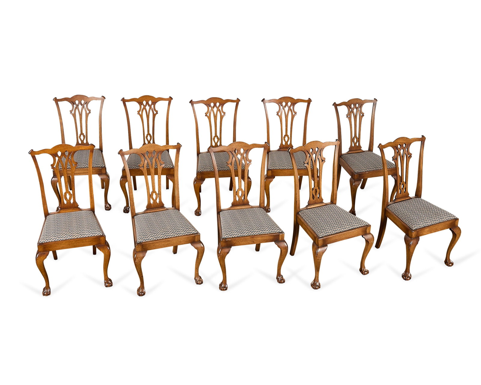 10 Charak Furniture Co. Chippendale Style Chairs: Charak Furniture Company, United States. Set of ten mahogany Chippendale-style dining chairs, 20th century. Each with a shaped top rail and pierced vasiform back splat. Atop cabriole legs terminating 