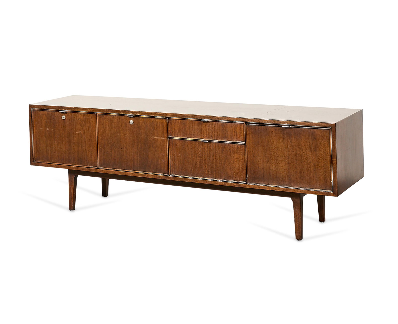 Stow & Davis MCM Walnut Wood Office Credenza: Stow & Davis, United States. Mid-century modern walnut office credenza or sideboard console table, ca. 1960s. Featuring four drawers and one drop door storage cabinet. With chrome hardware. Ink-stampe