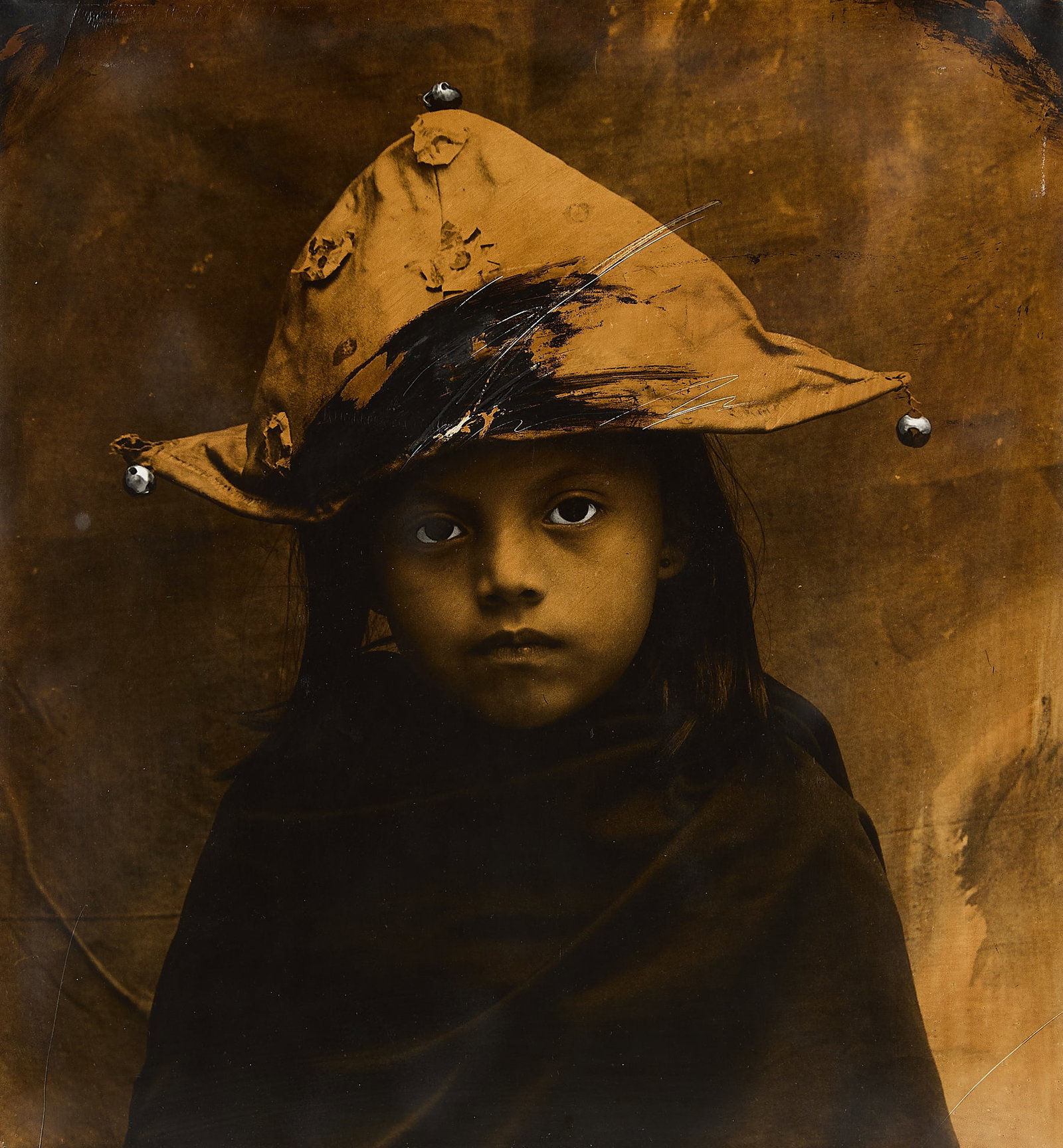 Luis Gonzalez Palma "El Gorro" GSP Photograph 1990: Luis Gonzalez Palma (Guatemalan, b. 1957). Hand-painted gelatin silver print photograph on hand-painted board titled "El Gorro (The Cap)," 1990. Depicting a young child wearing a pyramidic hat. Pencil
