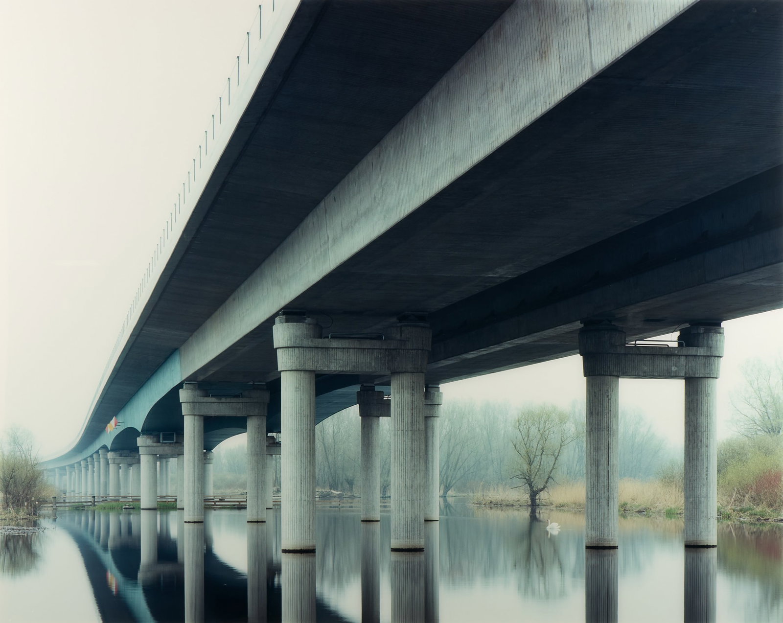 Hans-Christian Schink "A20 Peenebruecke" Photo: Hans-Christian Schink (German, b. 1961). C-print photograph titled "A 20 Peenebruecke," 2002. Depicting the titular 1.1 kilometer highway bridge carrying the A 20 Autobahn freeway across the Peene