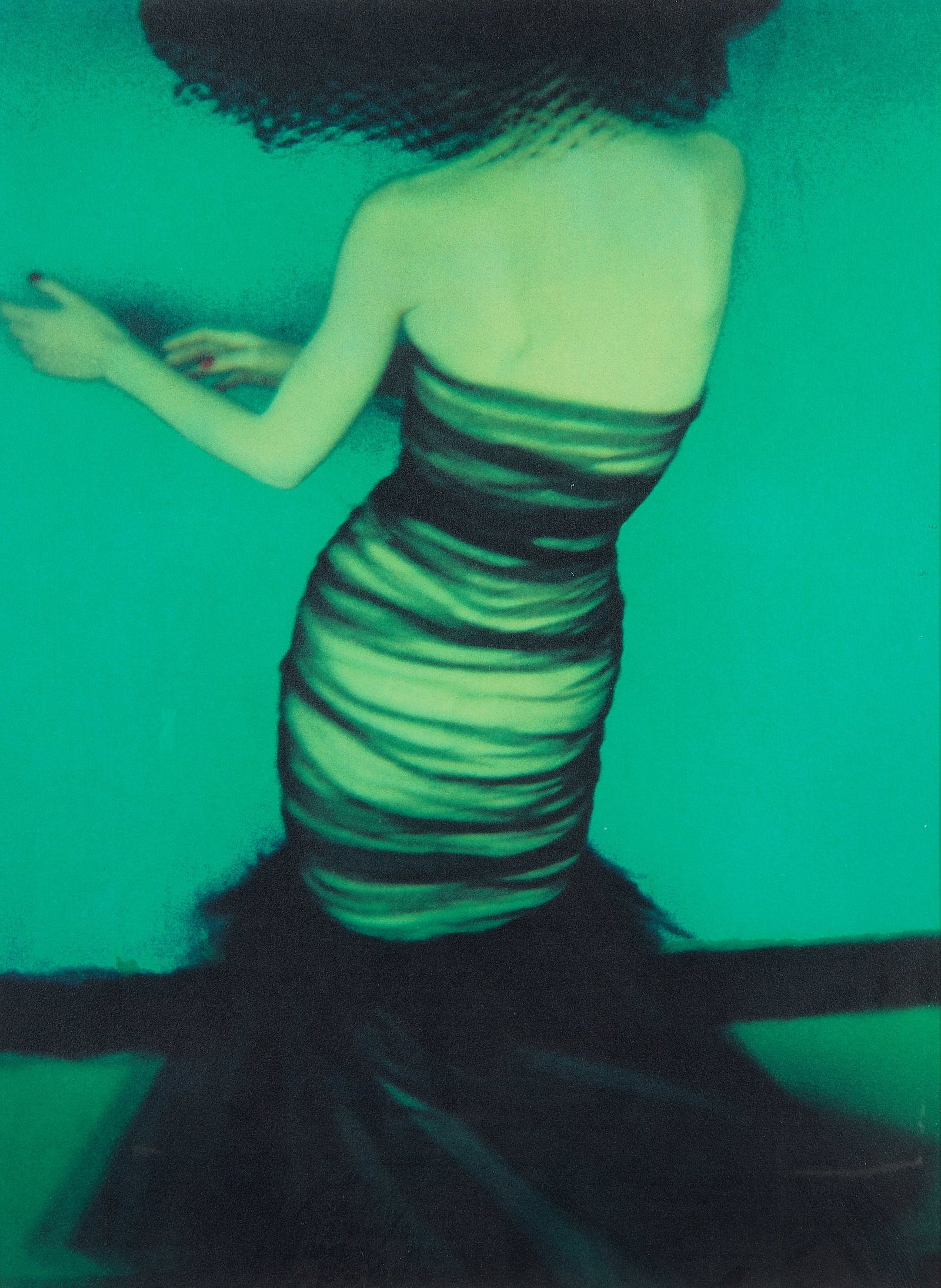 Sarah Moon Fashion Model C-Print Photograph: Sarah Moon (French, b. 1941). Chromogenic photograph print titled "Fashion No. 3. Chanel," 1998. Depicting the back of a fashion model wearing a ruched, sheer black dress. Pencil signed, titled, dated