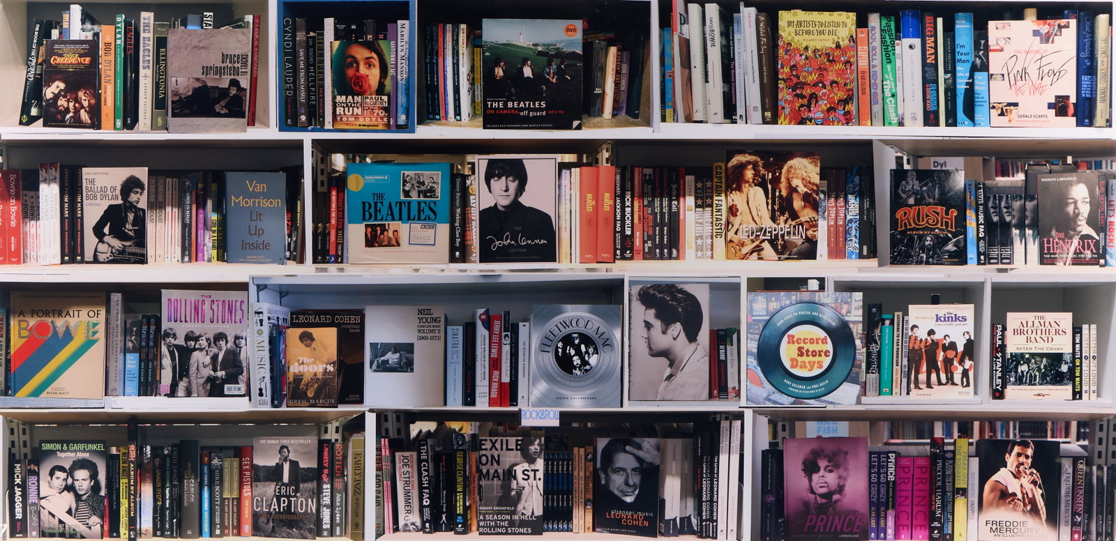 Max Steven Grossman "Rock W9" Photograph: Max Steven Grossman (Columbian, b. 1971). Large metallic photograph print on diasec acrylic mount titled "Rock W9," 2017; from the "Bookscapes" series. Depicting a bookshelf centered around the theme 