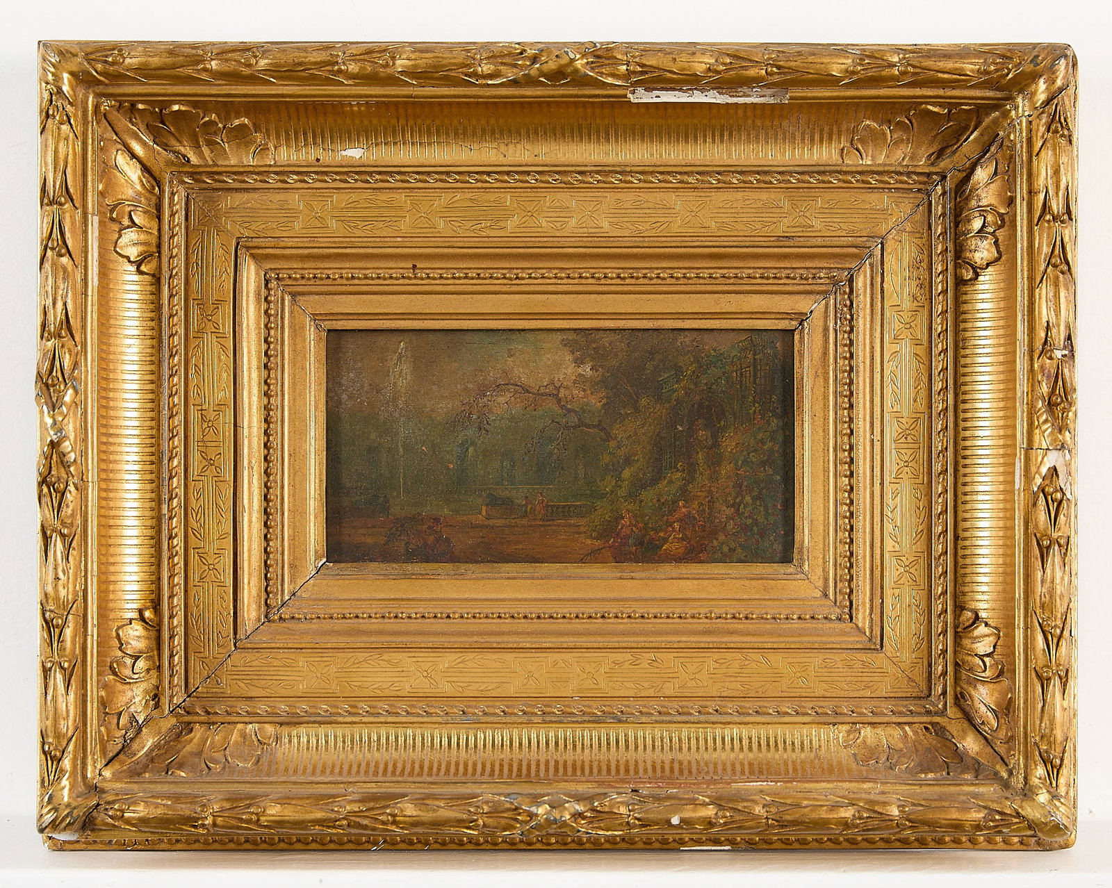 Style of Watteau French School Oil Painting: Style of Jean- Antoine Watteau (French, 1684-1721). French school oil on board painting depicting scattered figures beside the decorated facade of a building masked by lush foliage. With a toned Mende