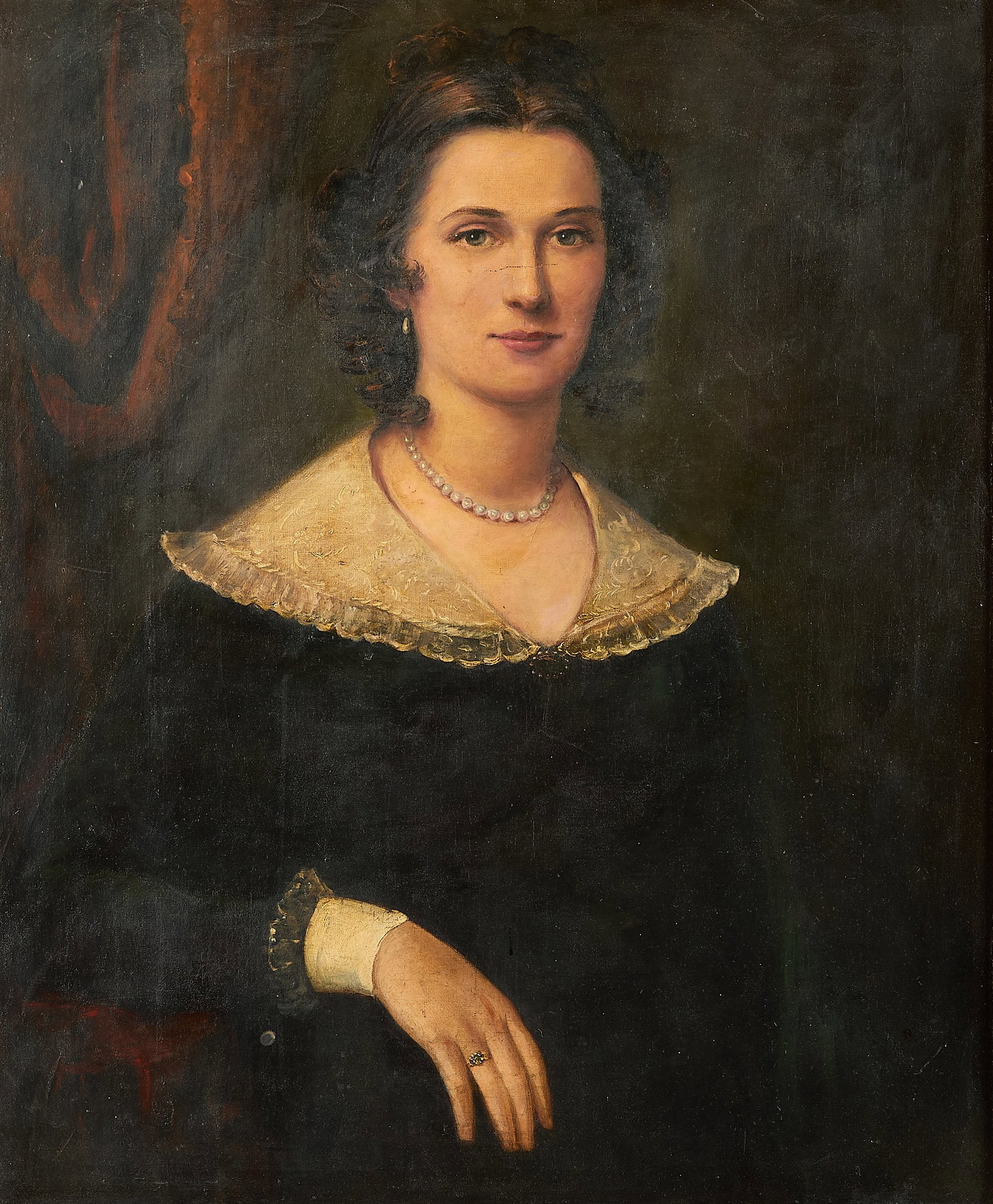 Old Master Portrait of a Woman Oil Painting: Old Master oil on canvas painting depicting the portrait of an elegant woman in a black dress with pearl jewelry. With a faded inkstamp along the verso. Unframed; height: 30 in x width: 25 1/4 in. Fra