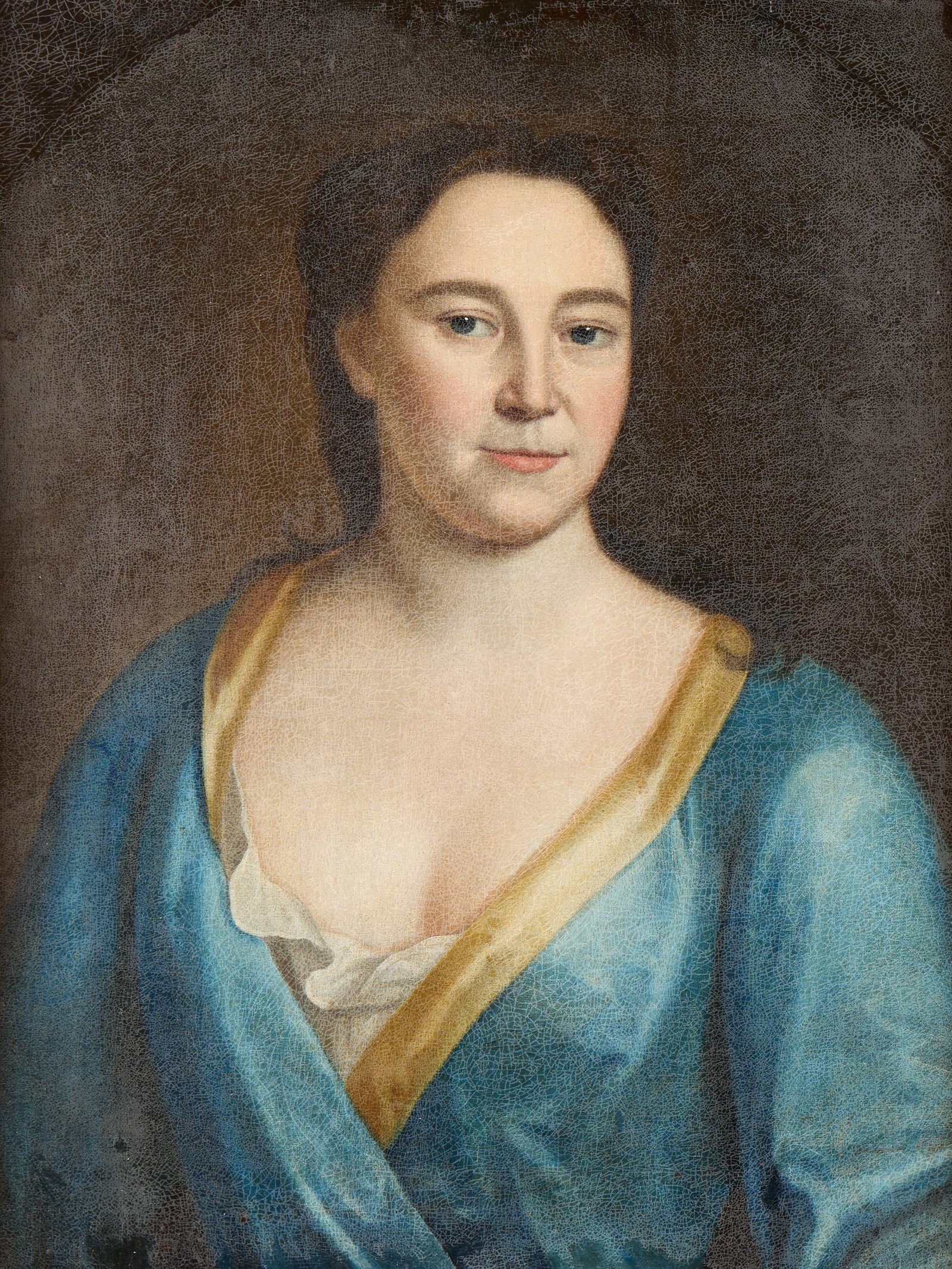 18th c. Portrait of a Woman Oil Painting: Oil on canvas painting depicting the portrait of an elegant woman, 18th century. Her light blue and yellow robe complements her dark brunette hair. Unframed; height: 25 in x width: 19 in. Framed; heig