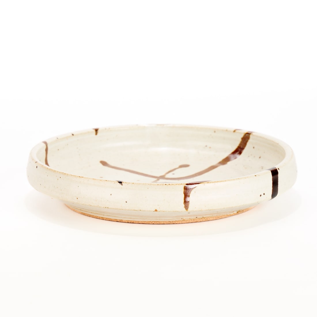 Warren Mackenzie Studio Pottery Dish - Marked: Warren MacKenzie (American, 1924-2018). Studio pottery ceramic dish, serving platter, or shallow bowl. Stoneware with a white glaze and slip trails. Stamped along the footrim. Warren MacKenzie was a