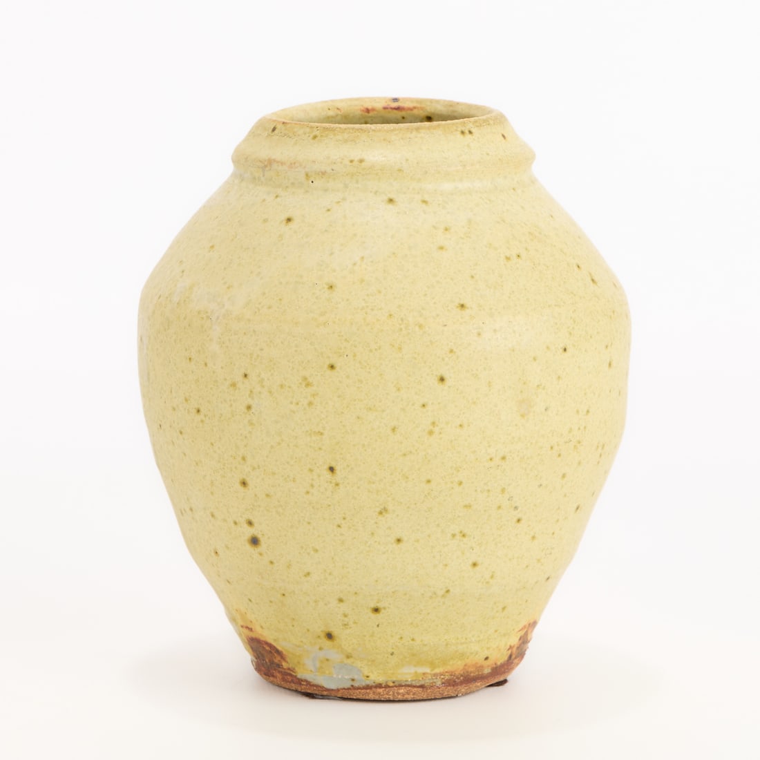 Warren MacKenzie Studio Pottery Bud Vase - Marked: Warren MacKenzie (American, 1924-2018). Studio pottery ceramic vase. Stoneware with a matte yellow glaze. Stamped along the footrim. Warren MacKenzie was a renowned Minnesota studio potter. A student 