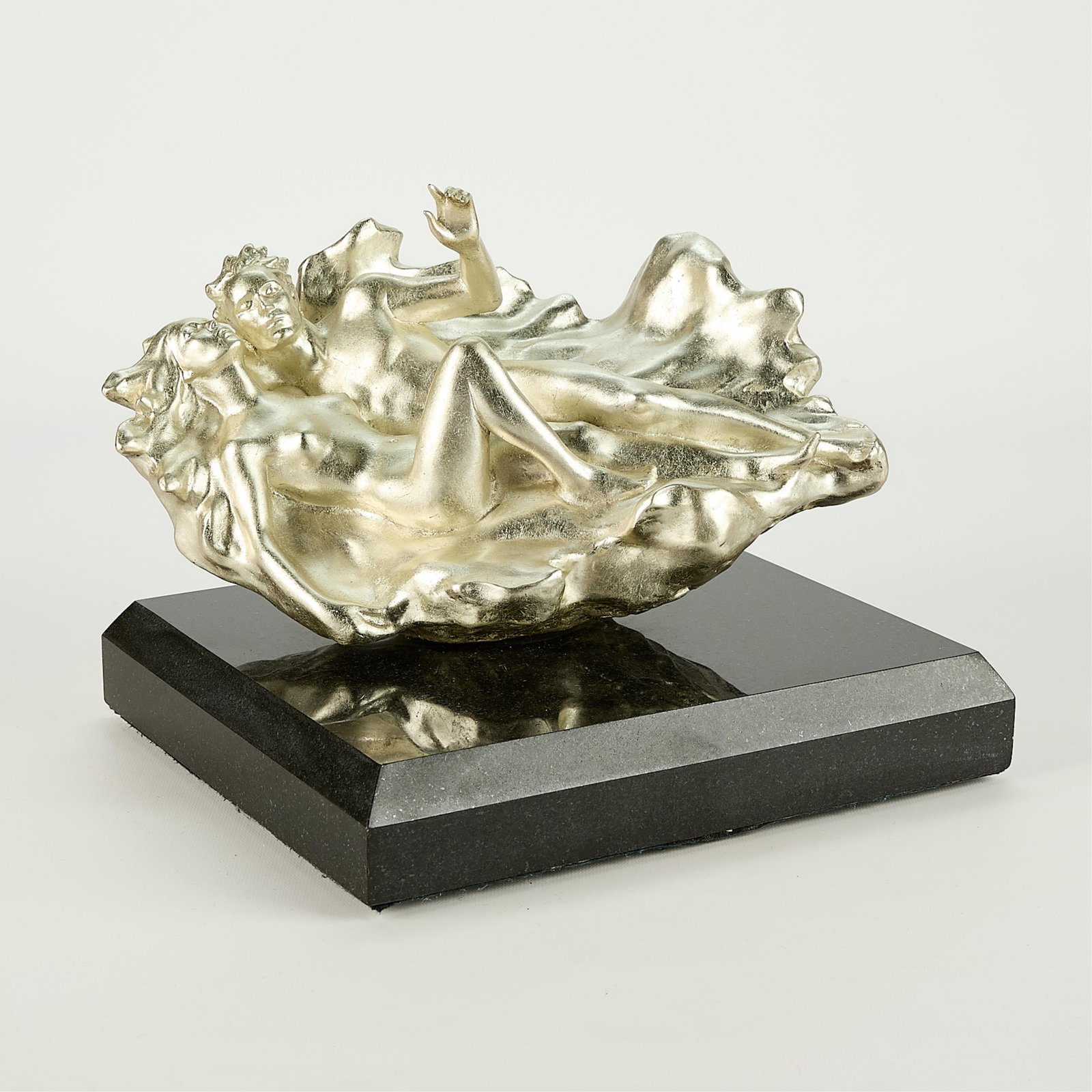 Frederick Hart "Genesis" Bronze with Silver Patina: Frederick Hart (American, 1943-1999). Bronze sculpture with silver patina or leafing, titled "Genesis" depicting lounging male and female figures, 1988. Mounted atop a marble base. Inspired by The Cre