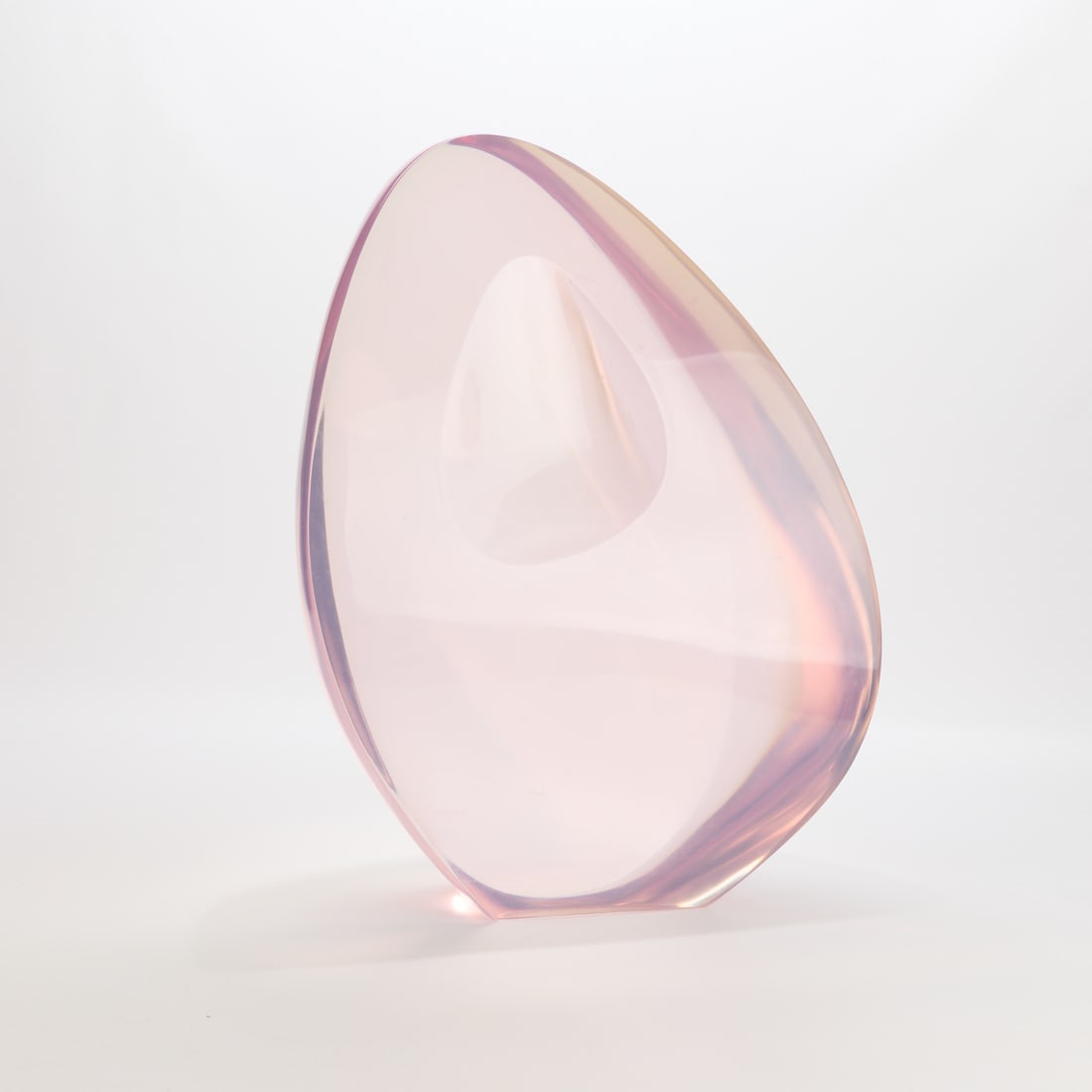 Louis Von Koelnau Abstract Polyresin Sculpture: Louis "Red" von Koelnau (American, 1924-2015). Light pink acrylic polyresin sculpture of abstract form with a dimpled impression along the center, 1980. Incised signature, dated, and numbered 10/24 al