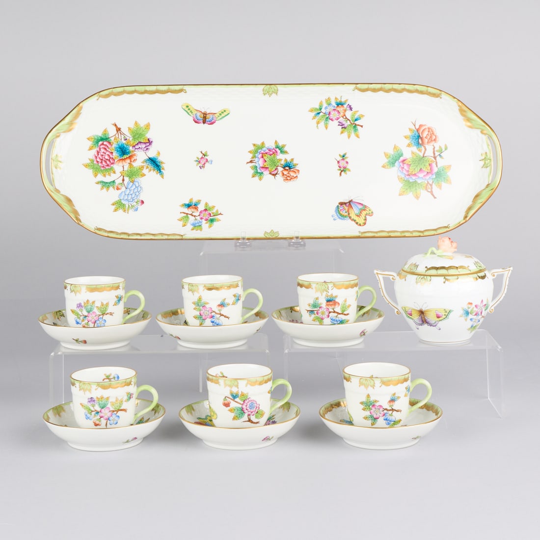 14 Pc Herend "Queen Victoria" Porcelain Coffee Set: Herend, Hungary. Set of 14 porcelain dishes in pattern "Queen Victoria," 19th century. Including one rectangular tray, six demitasse cups, six demitasse saucers, and one sugar bowl. Inkstamped maker's