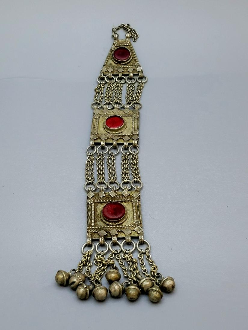 Antique\Old Ethnic Islamic (Low) Silver Chest Ornament-Pendant: Antique\Old Ethnic Islamic (Low) Silver Chest Ornament-Pendant, 20th century, composed of three central parts set in their center with round red glass, and connected between them with chains off the l