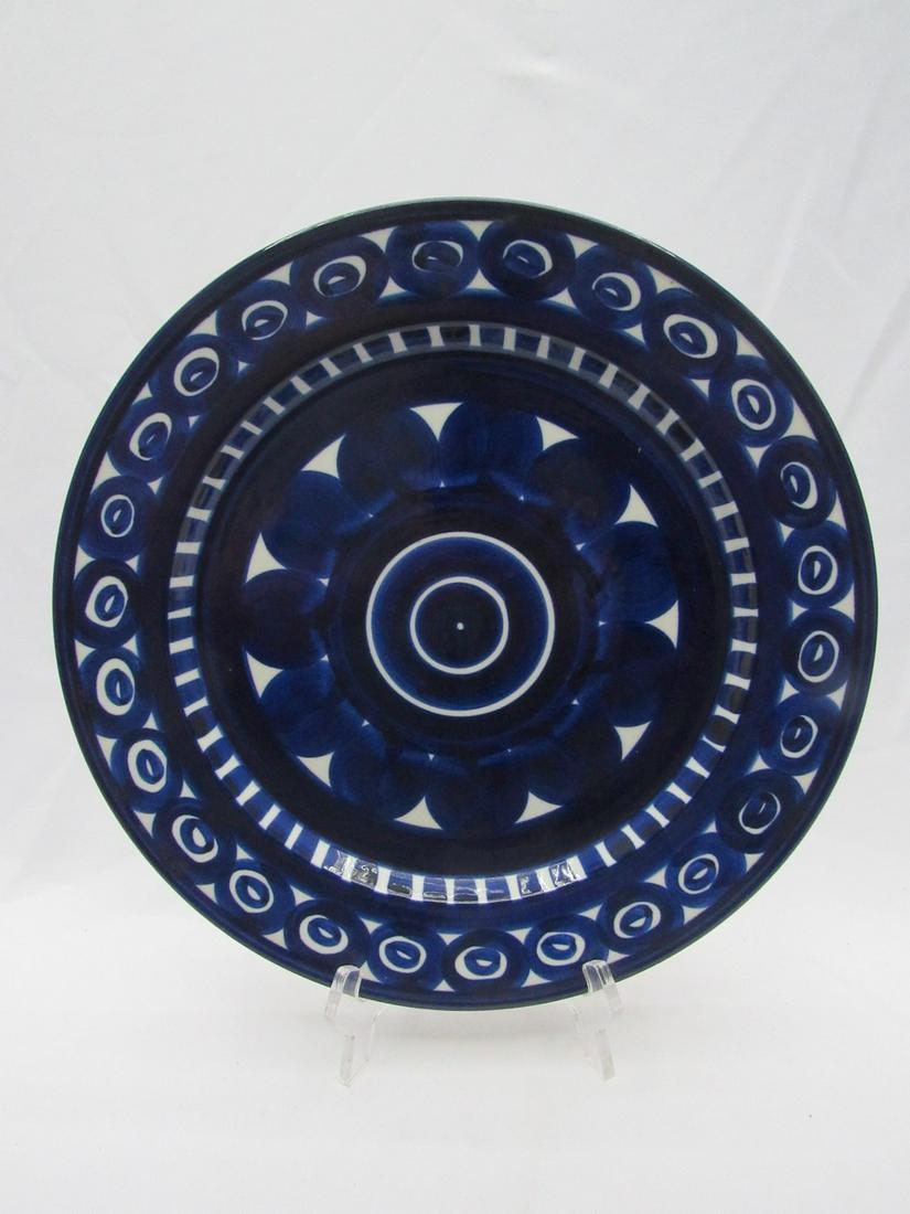 A large ceramic central serving platter made by Arabia Finland, Valencia model designed by Ulla: A large ceramic central serving platter made by Arabia Finland, Valencia model designed by Ulla Procope, 1960s, decorated with rich cobalt blue hand painting on a white background, signed, diameter: 3
