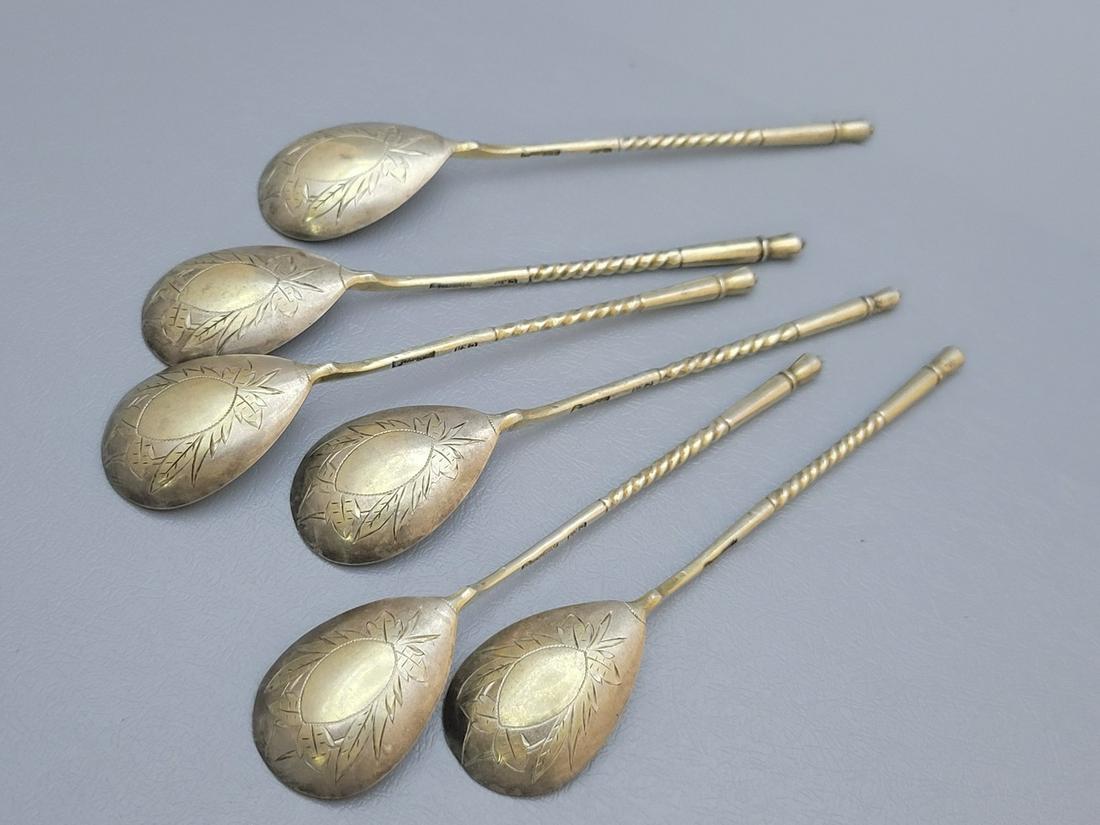 Set of 6 Imperial Russian 84 Silver Spoons Made by Stephan Kuzmich Levin: Set of 6 Imperial Russian 84 Silver Spoons Made by Stephan Kuzmich Levin, Moscow 1895, designed with a curled handle, and decorated on the back with an engraving of plants and room in the center to in