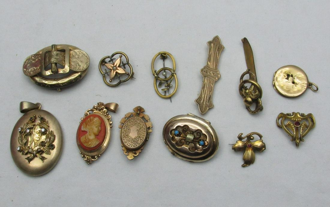 A Set Of 12 Antique Victorian Pinchbeck Jewelry Pieces: A Set Of 12 Antique Victorian Pinchbeck Jewelry Pieces, 19th century, including pendants, locket pendants and brooches, designed and decorated with various patterns, height/width: 2.5-6 cm. Light defe