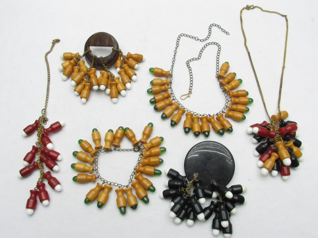 An Assortment Of Art Deco Jewelry Pieces Consisting Of Bakelite Game Pawns/Mouthpieces (1 of 5)