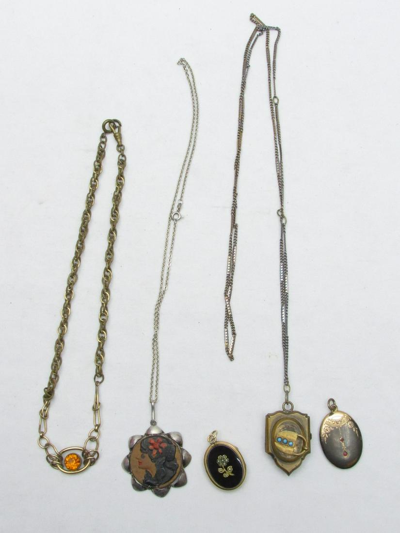 An Assortment of 5 Antique Necklaces And Pendants: An Assortment of 5 Antique Necklaces And Pendants, some early from circa 1900, including 3 opening locket pendants: of which 2 are from the Art Nouveau period, one is threaded on a long original chain