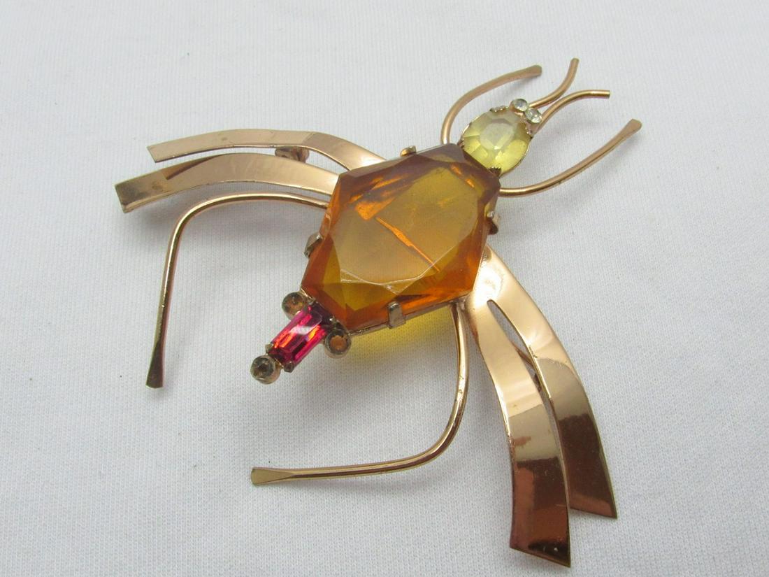 Gold-plated sterling silver fashion "Fly" brooch made by Coro: Gold-plated sterling silver fashion "Fly" brooch made by Coro, decorated with colored polished glass inlays, signed, weight: 16.7 g, dimensions: 7.5X8 cm.