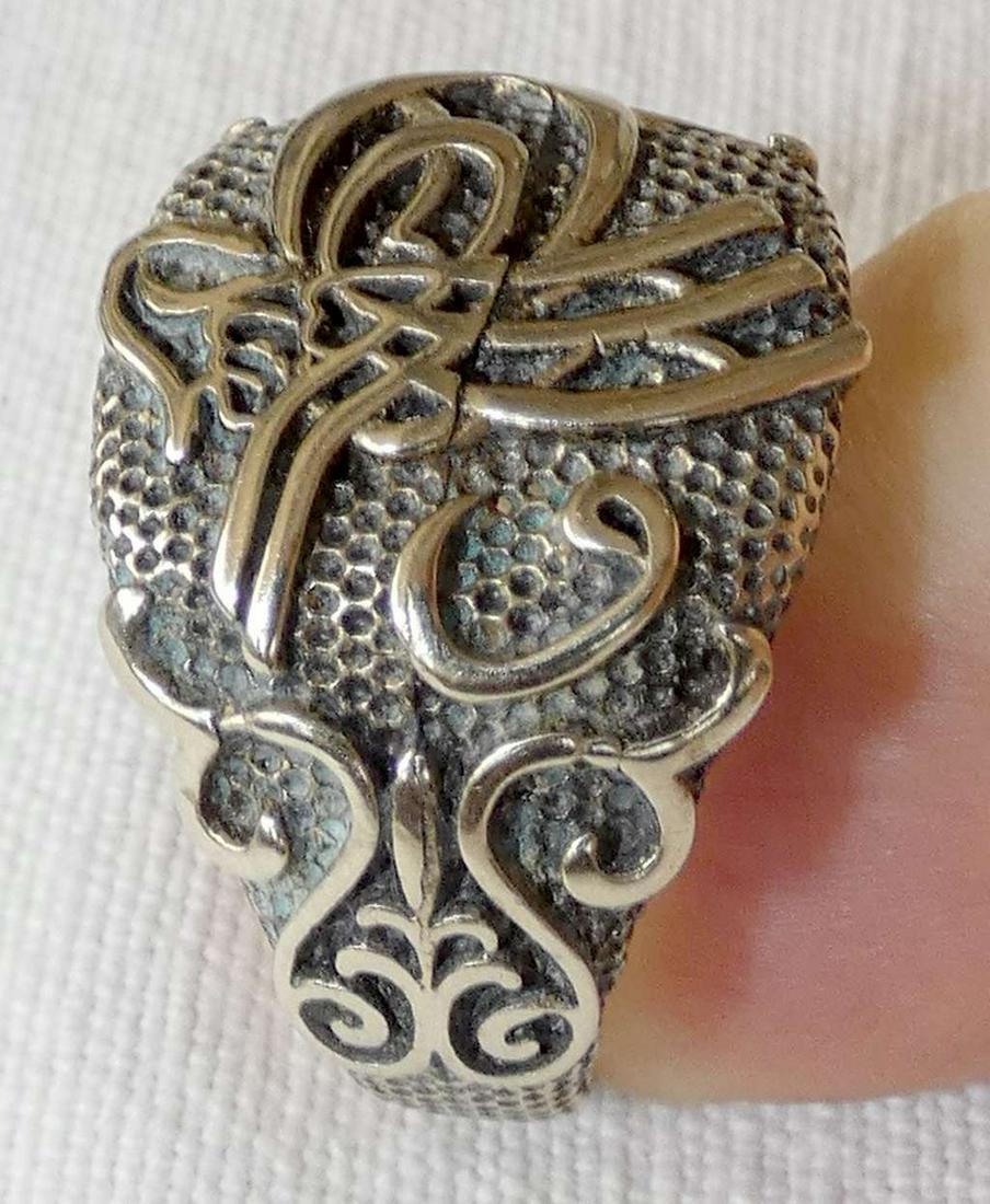 Ottoman Turkish antique filigree silver â€œTughraâ€ men ring, size: 10.5-10.75: Ottoman Turkish antique filigree silver â€œTughra” men ring, size: 10.5-10.75 Tested for silver by acid. Width to top: 1.8 cm. (0.7 inches) Hand crafted, filigree, hammering