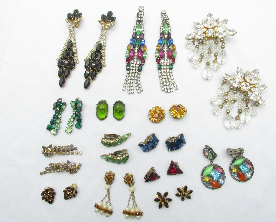 An Assortment Of 14 Pairs Of Fine Fashion Clip-On Earrings: An Assortment of 14 pairs of fine fashion clip-on earrings, from the Art Deco period of the 1930s to the 1980s, made of various metals, some of them gold, and decorated with inlays of colored Paste St