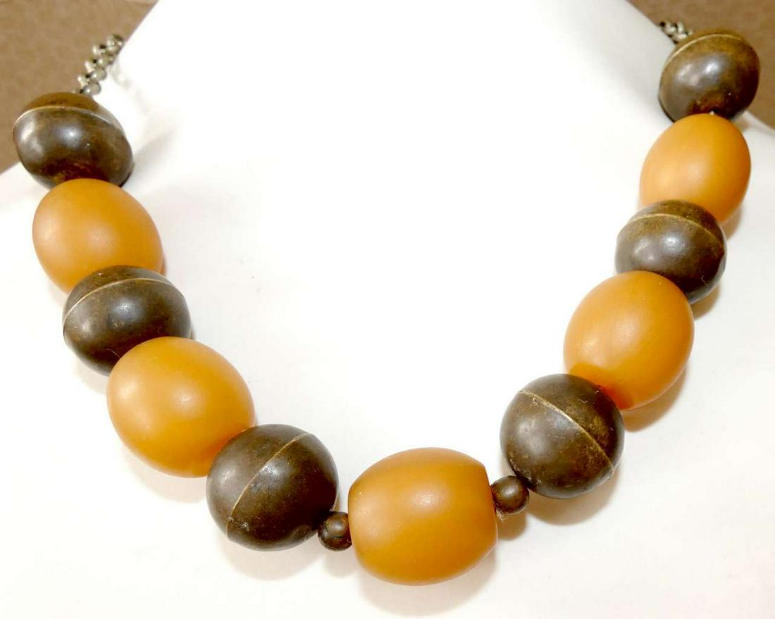 Ottoman Turkey Antique Faturan and brass bead necklace.: Ottoman Turkey Antique Faturan and brass bead necklace, 68 gr. Length 46 cm. (18.1 inches) Length central part: 24 cm. (9.4 inches) Diameter of beads ca. 2.1 cm. (0.8 inches)