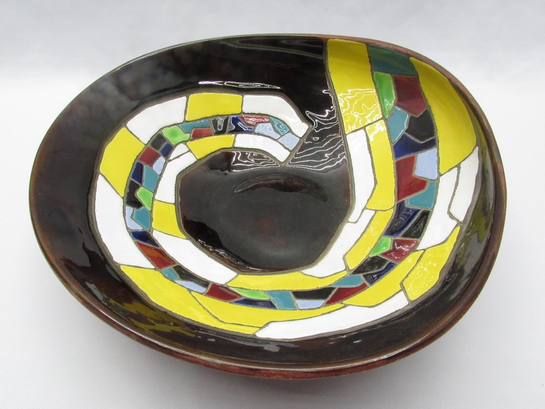 Israeli ceramic bowl made by "Keramos": Israeli ceramic bowl made by "Keramos", circa 1960s, decorated with an abstract pattern of colored mosaic on a dark brown background, while the hem and the reverse have a dark desert sand glaze, signe