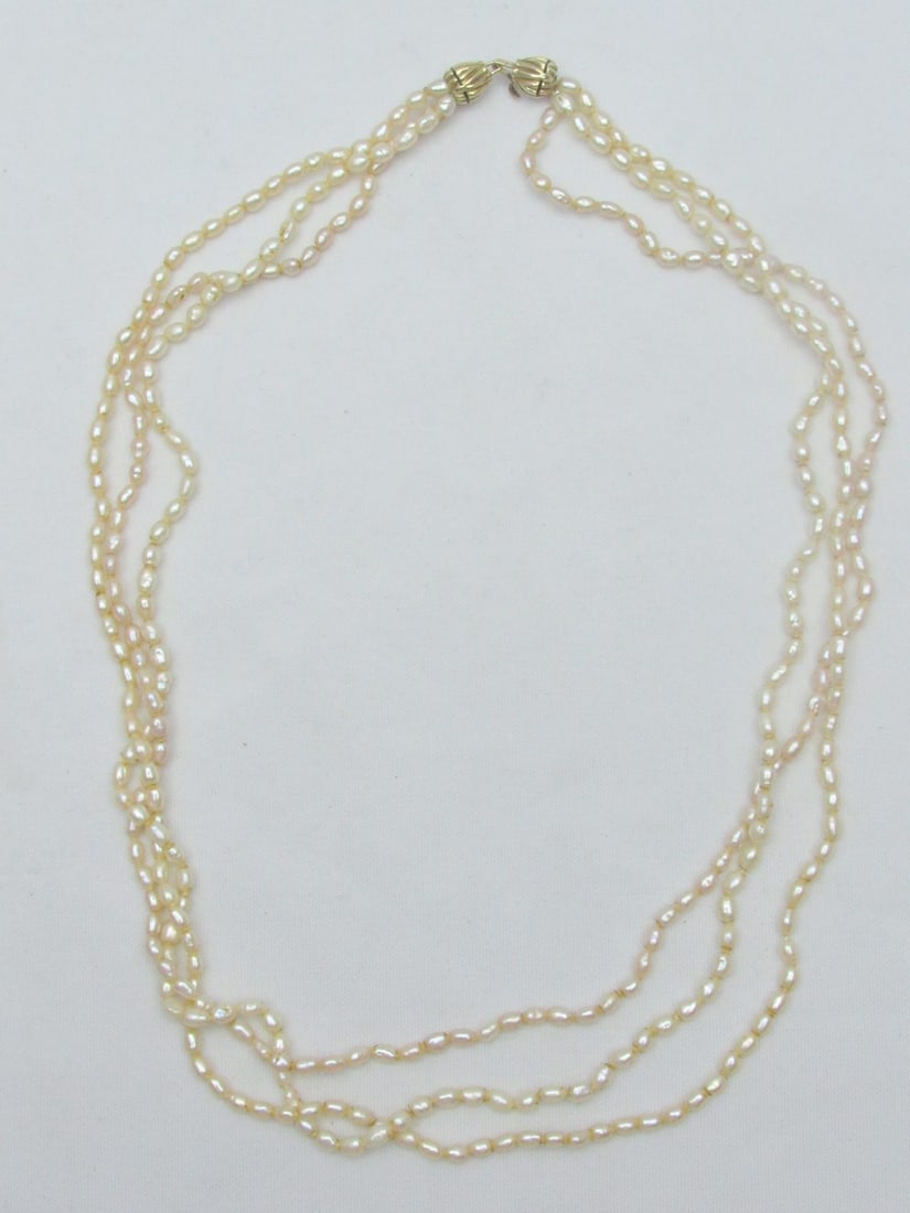 A "multi-chain" beaded necklace made of pearls and a 14K gold clasp (1 of 5)
