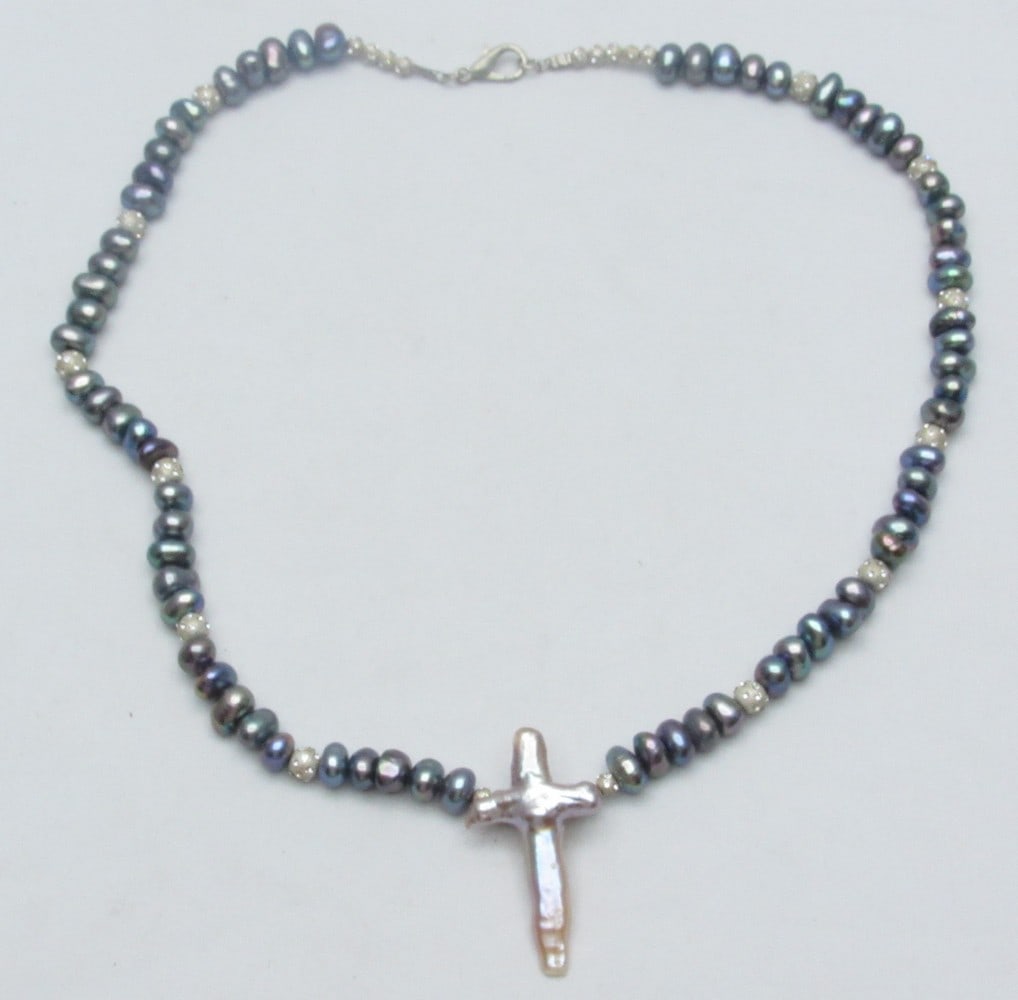 A beaded necklace made of gray pearls, silver balls and a mother of pearl cross pendant (1 of 8)