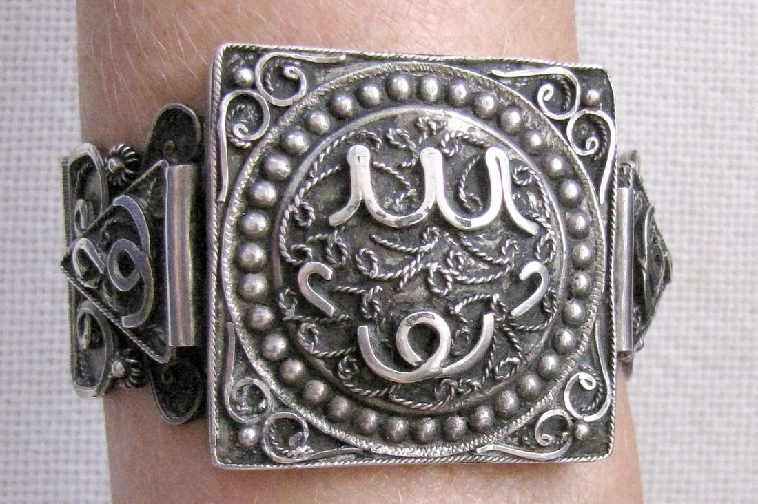 Ottoman Empire Turkey antique filigree silver sterling bangle amulet bracelet, signed, 54 gr.: Ottoman Empire Turkey antique filigree silver sterling bangle amulet bracelet, signed, 54 gr.Marked by silver hallmark and maker’s markInner size: 6.4 x 5.7 cm. (2.5 x 2.2 inches)Total inner length: