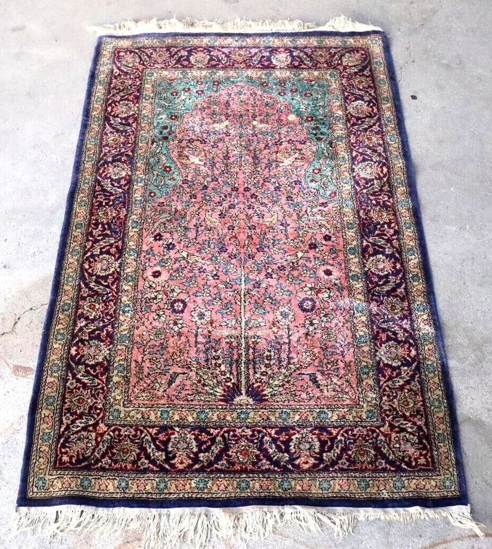 An old carpet in Persian Qum style (1 of 8)