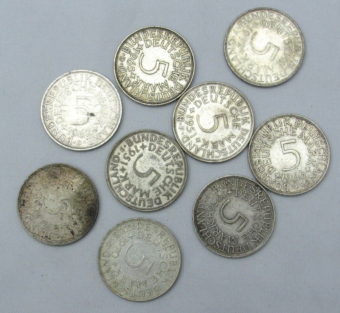 An assortment of 9 German 5 mark silver coins (1 of 3)