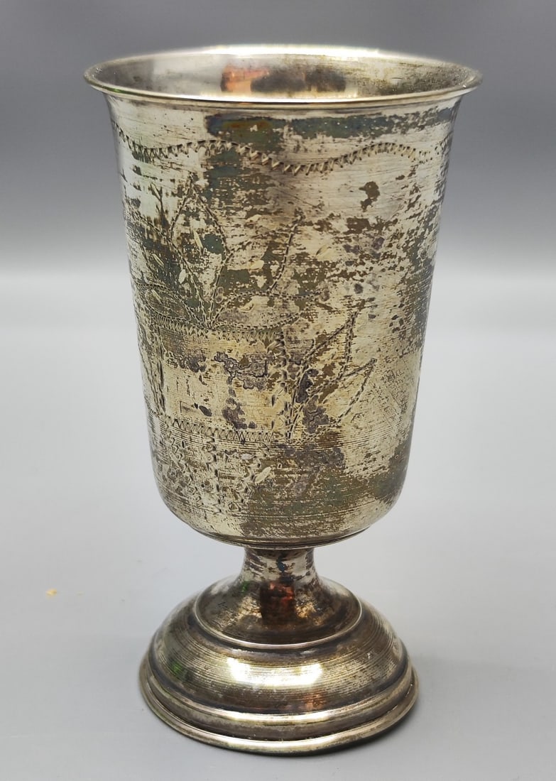 833 Silver Kiddush goblet made by Leo Gersting, Israel, Mandate period, 1930s-1940s: 833 Silver Kiddush goblet made by Leo Gersting, Israel, Mandate period, 1930s-1940s, decorated with artistal handcrafted engraving with a plant pattern and a cartouche with room for engraving the owne